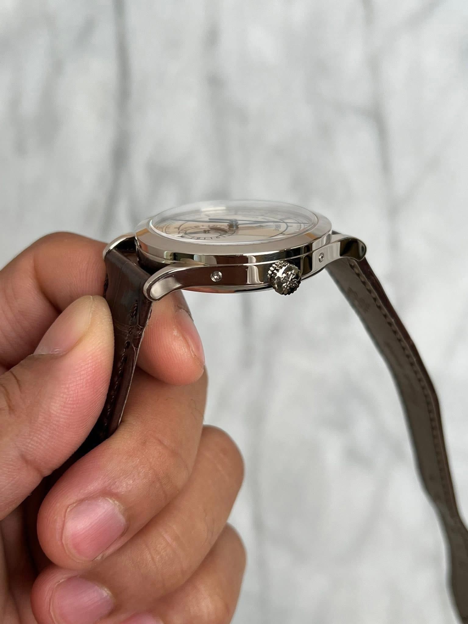 May be an image of wrist watch and eyewear