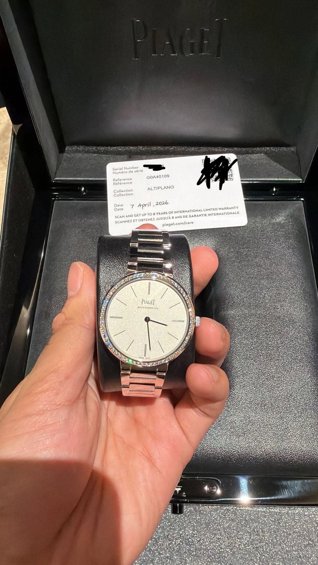 May be an image of wrist watch and text