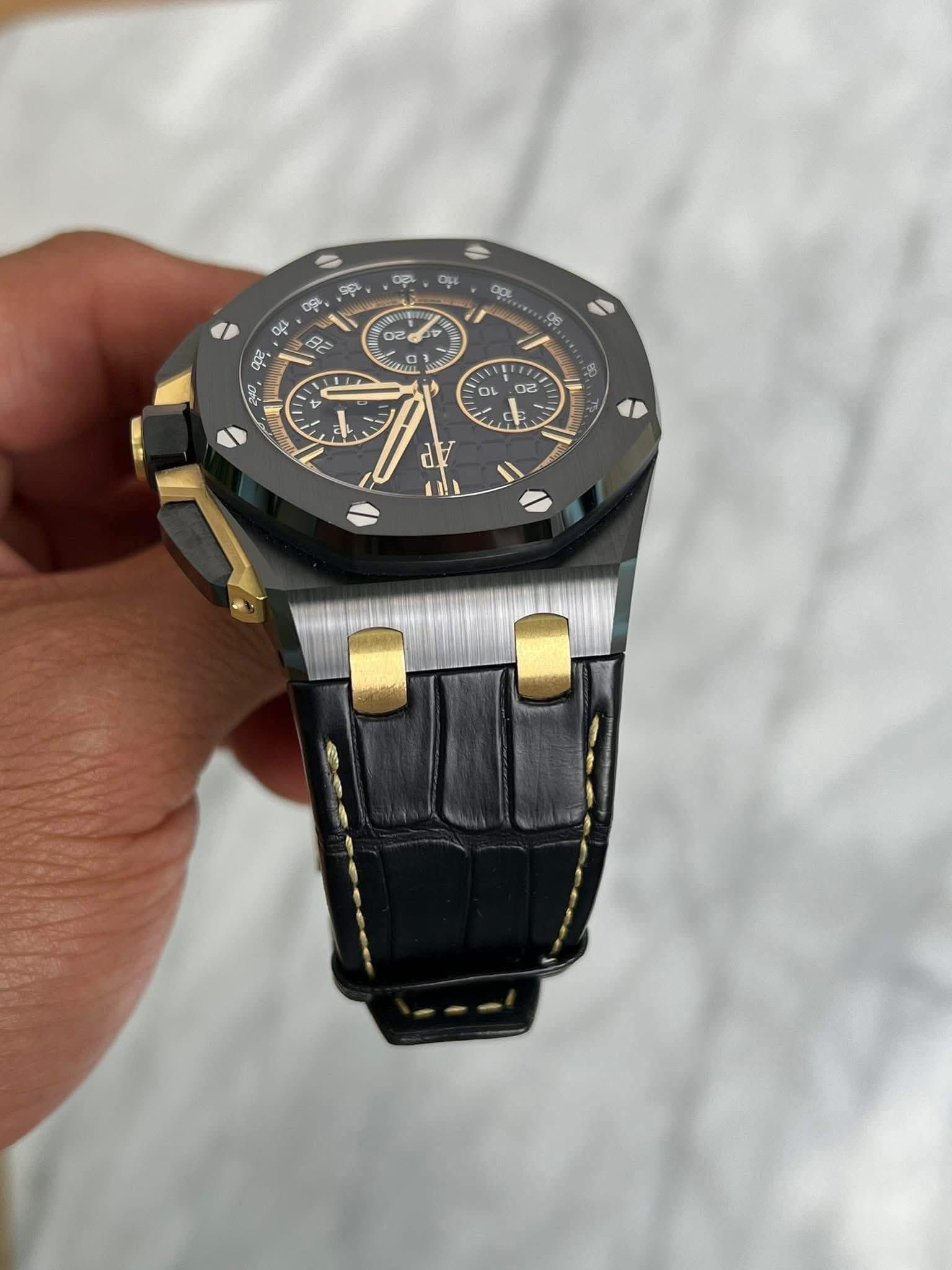 May be an image of wrist watch and text