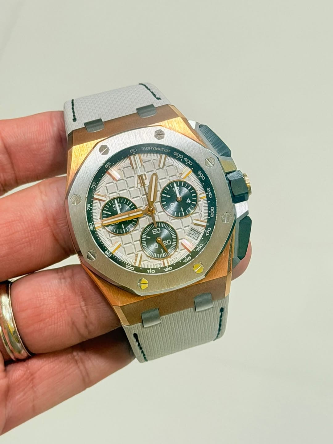 May be an image of wrist watch and text