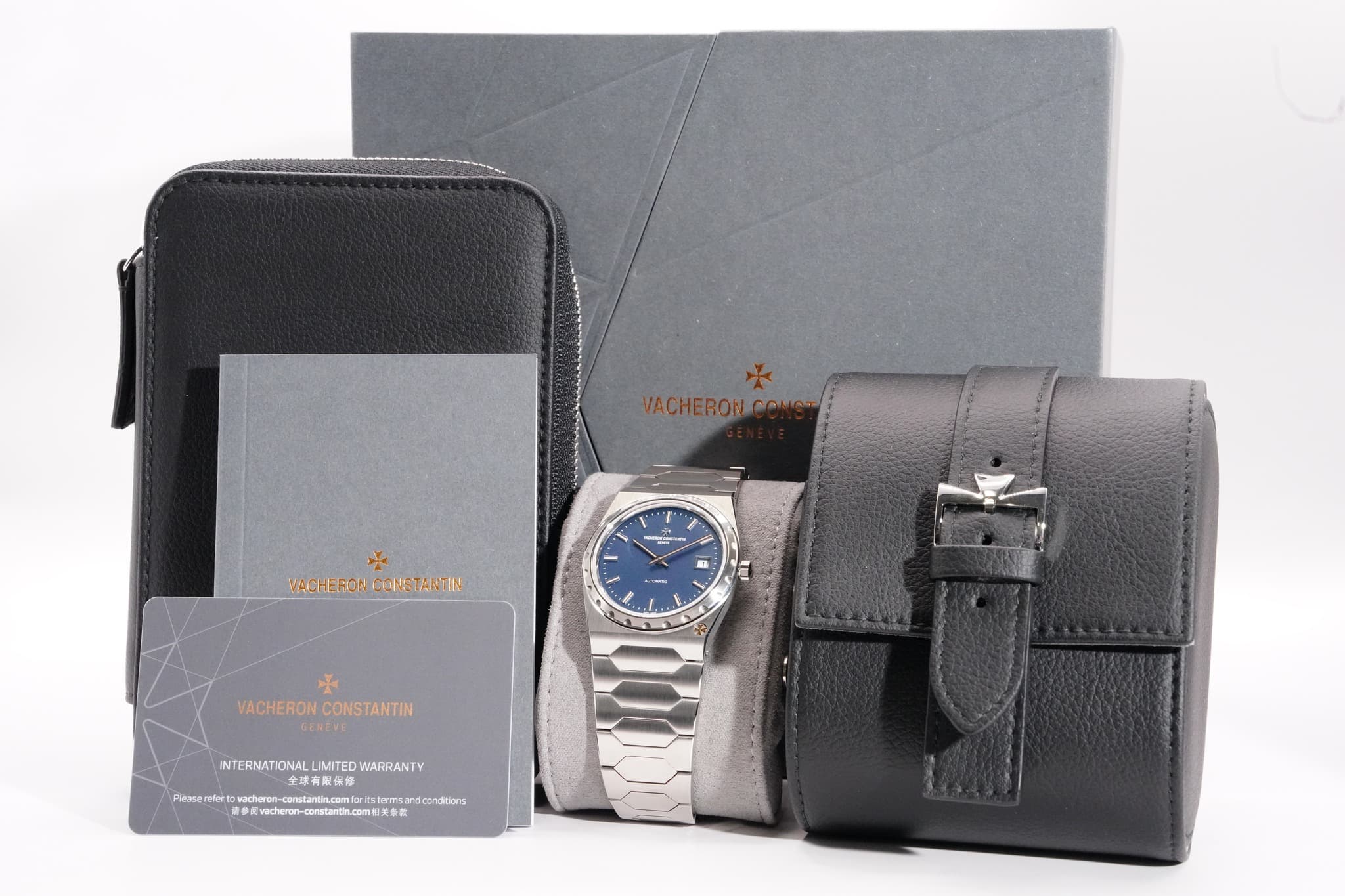 May be an image of leather wallet, saddle-stitched leather, wrist watch, leather and text