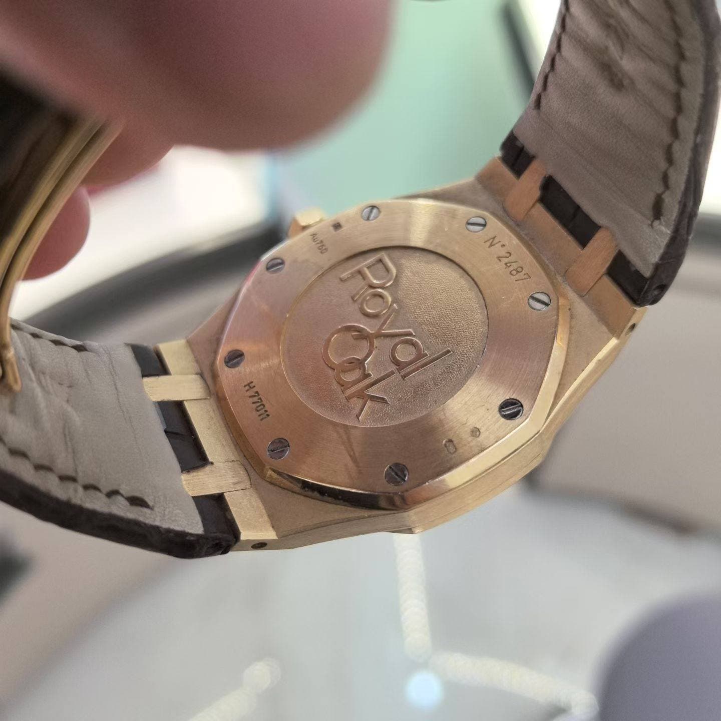 May be an image of wrist watch and text