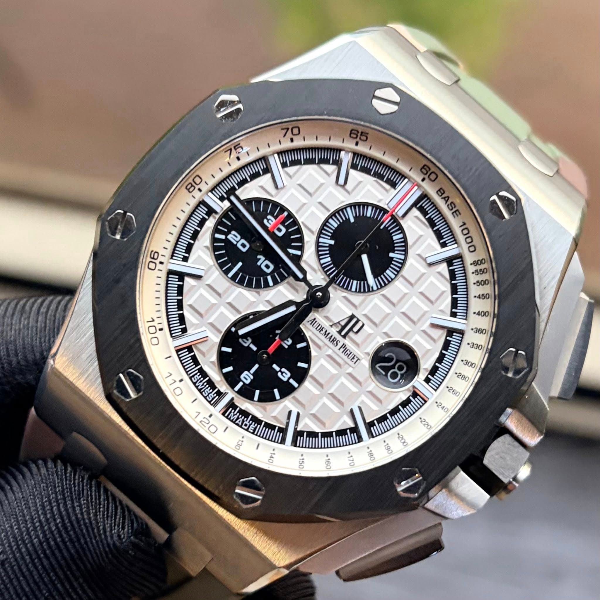 May be an image of wrist watch and text