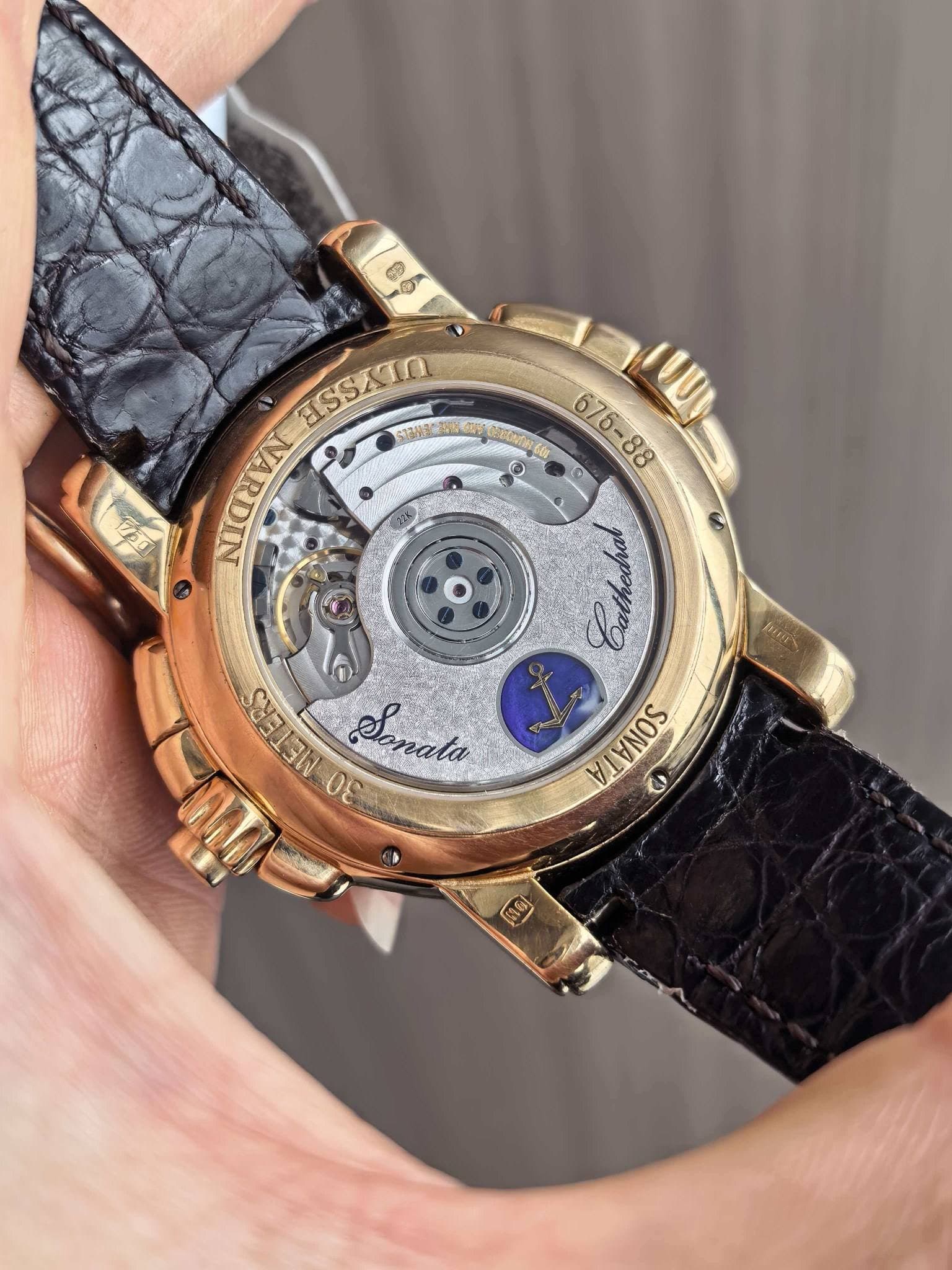 May be an image of wrist watch and text