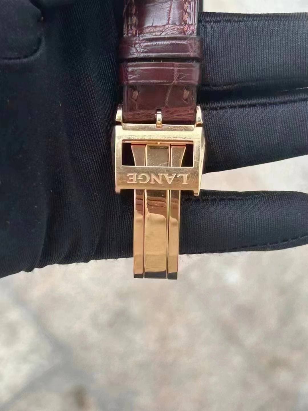May be an image of wrist watch