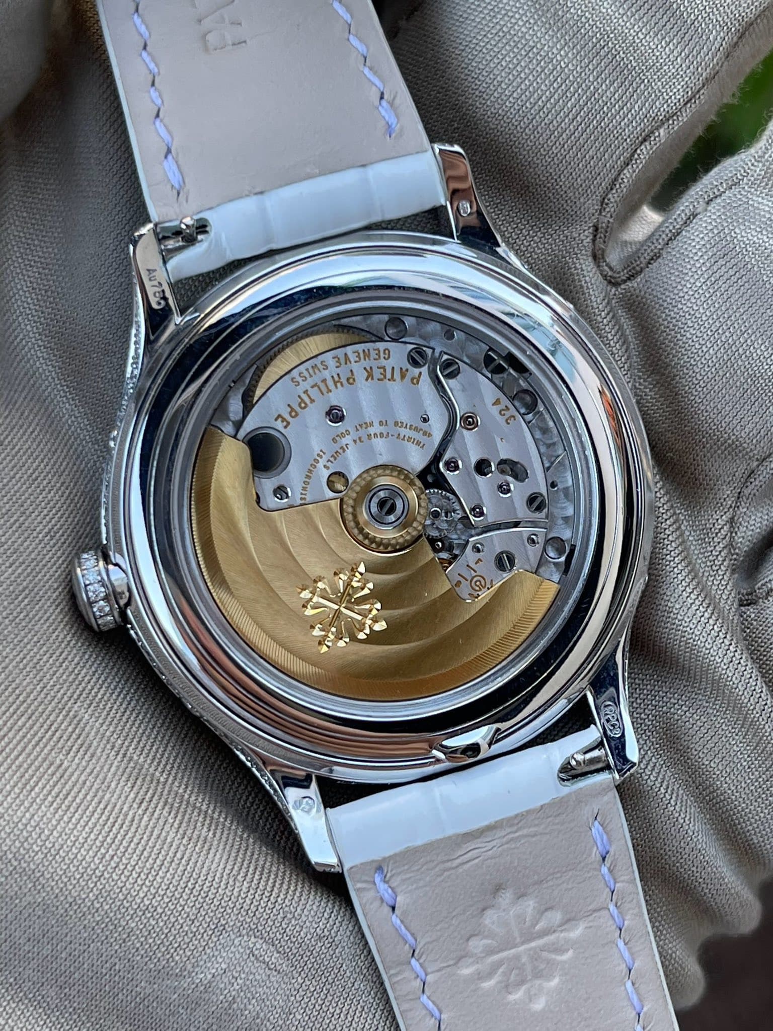 May be an image of wrist watch and text