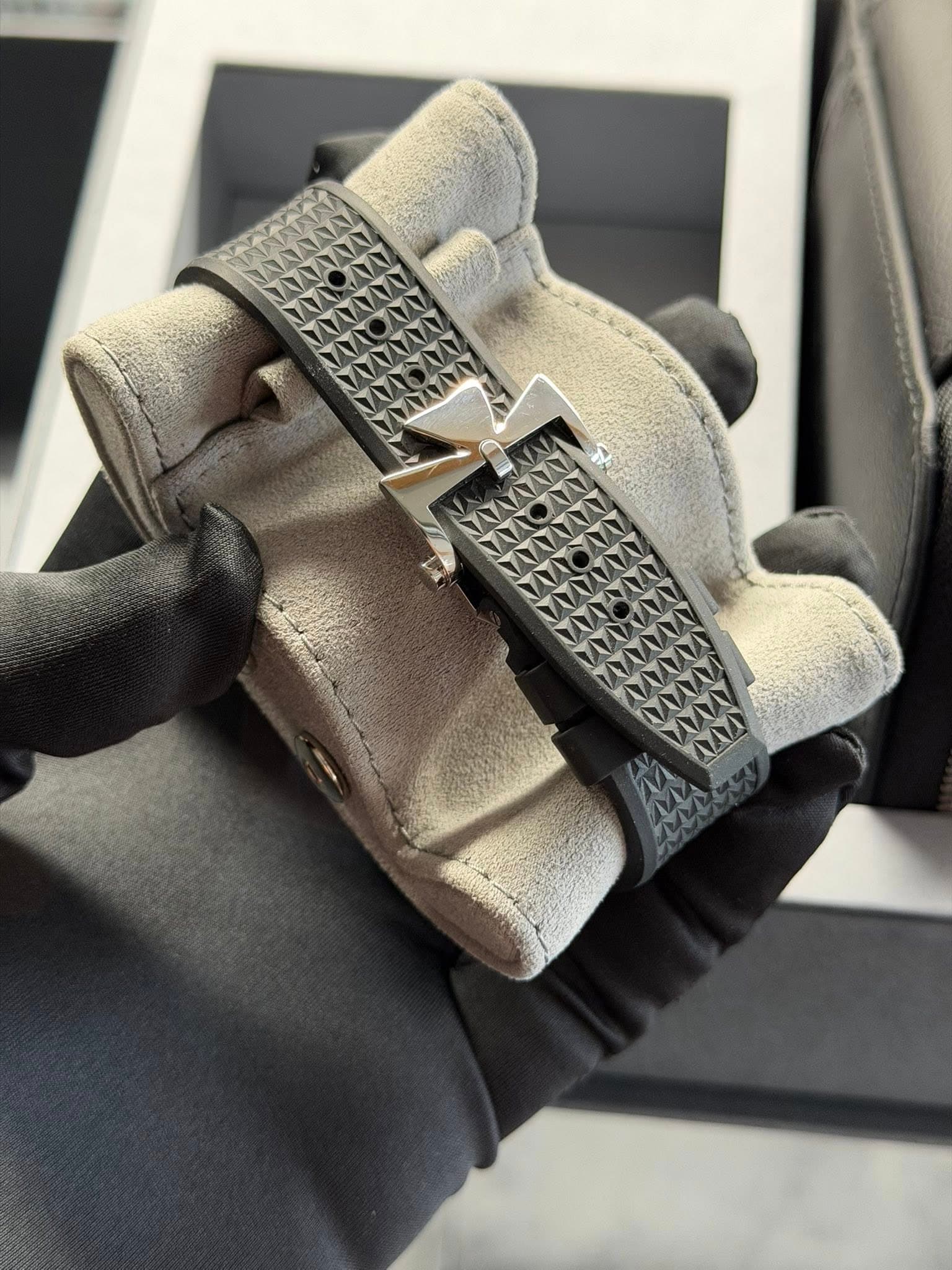 May be an image of leather and wrist watch