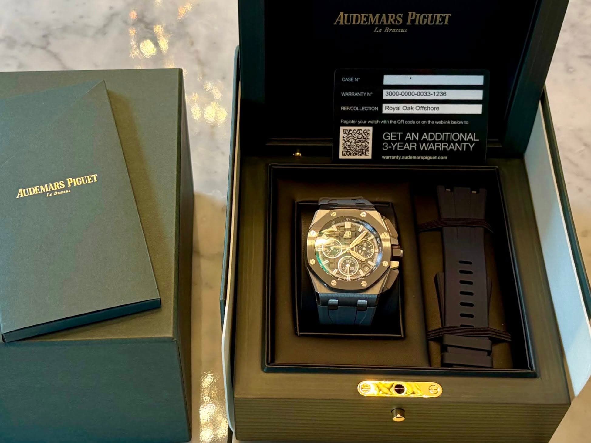 May be an image of digital watch and text that says ' Royal RoyalOakOftshore Oak Offshore AUDEMARS Breus AUDEMARSPIGUET PasINE PIGUET Brem GETANADDITIONAL ITIONAL ADD RWARRANTY'