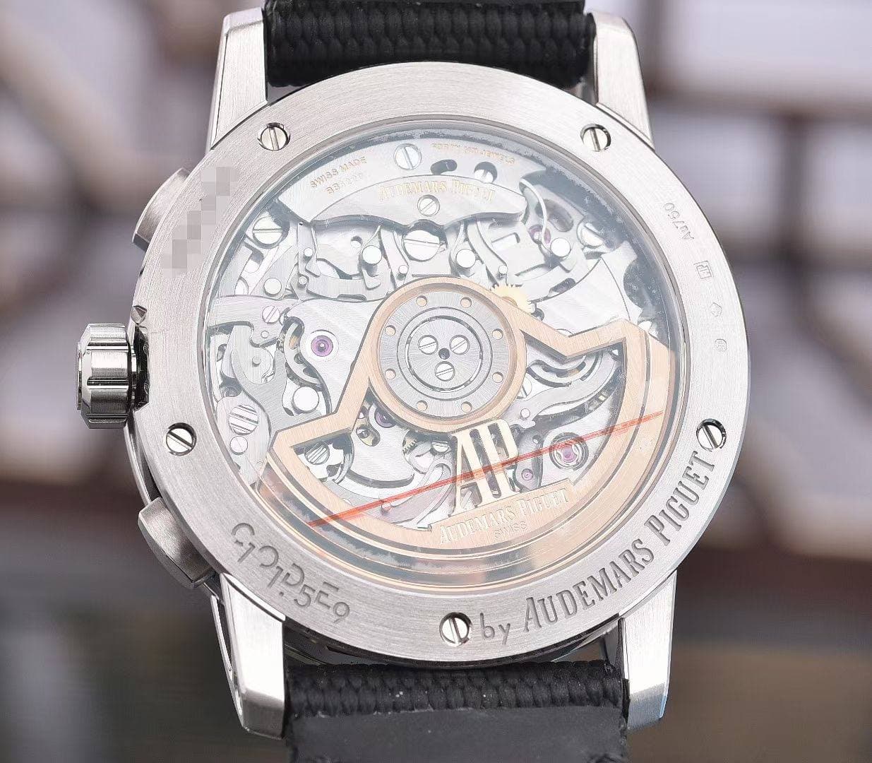 May be an image of wrist watch and text