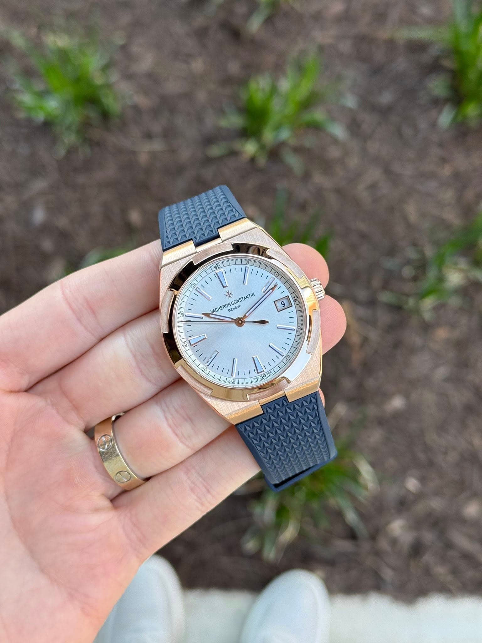 May be an image of wrist watch and text