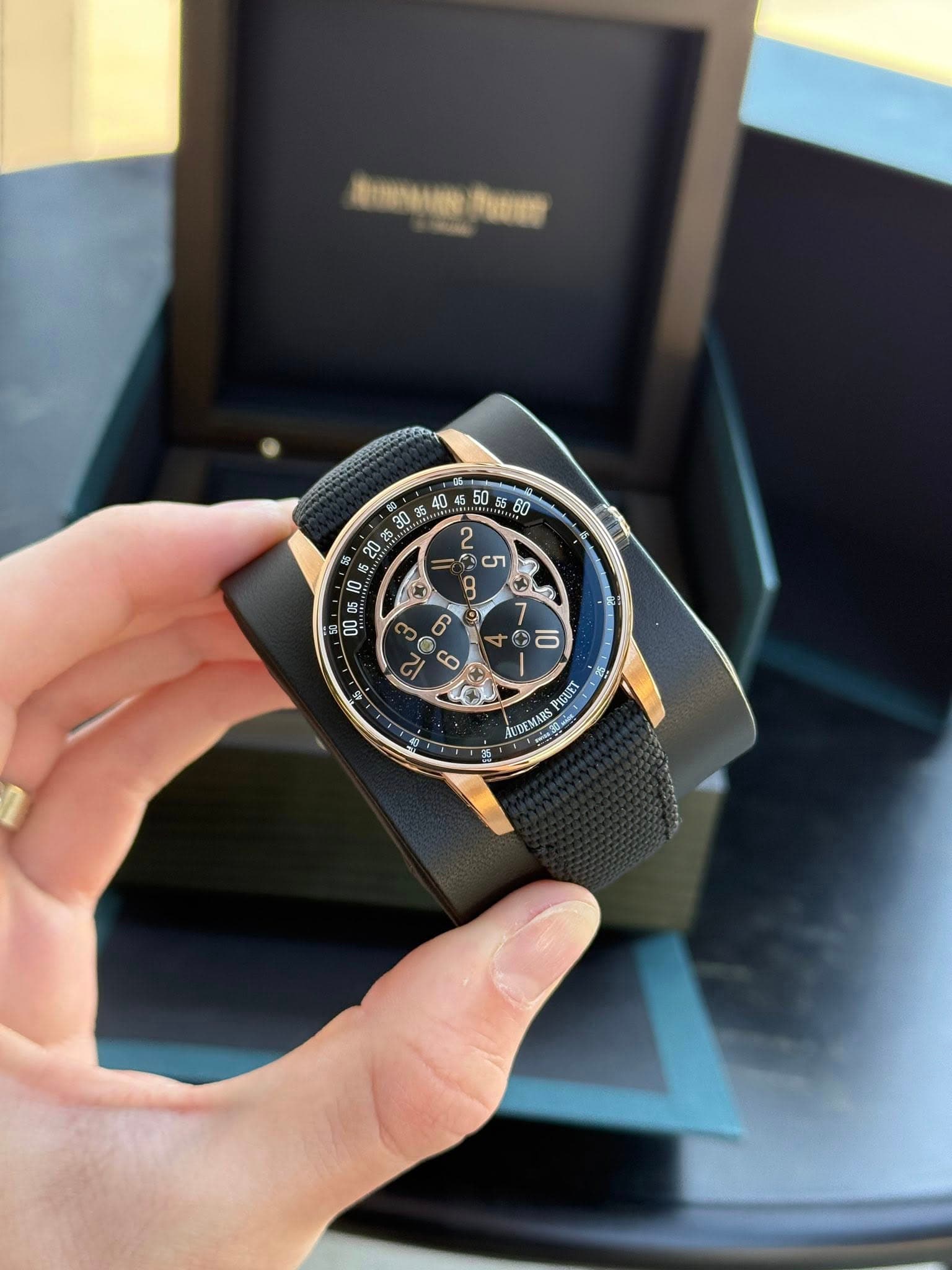 May be an image of wrist watch and text