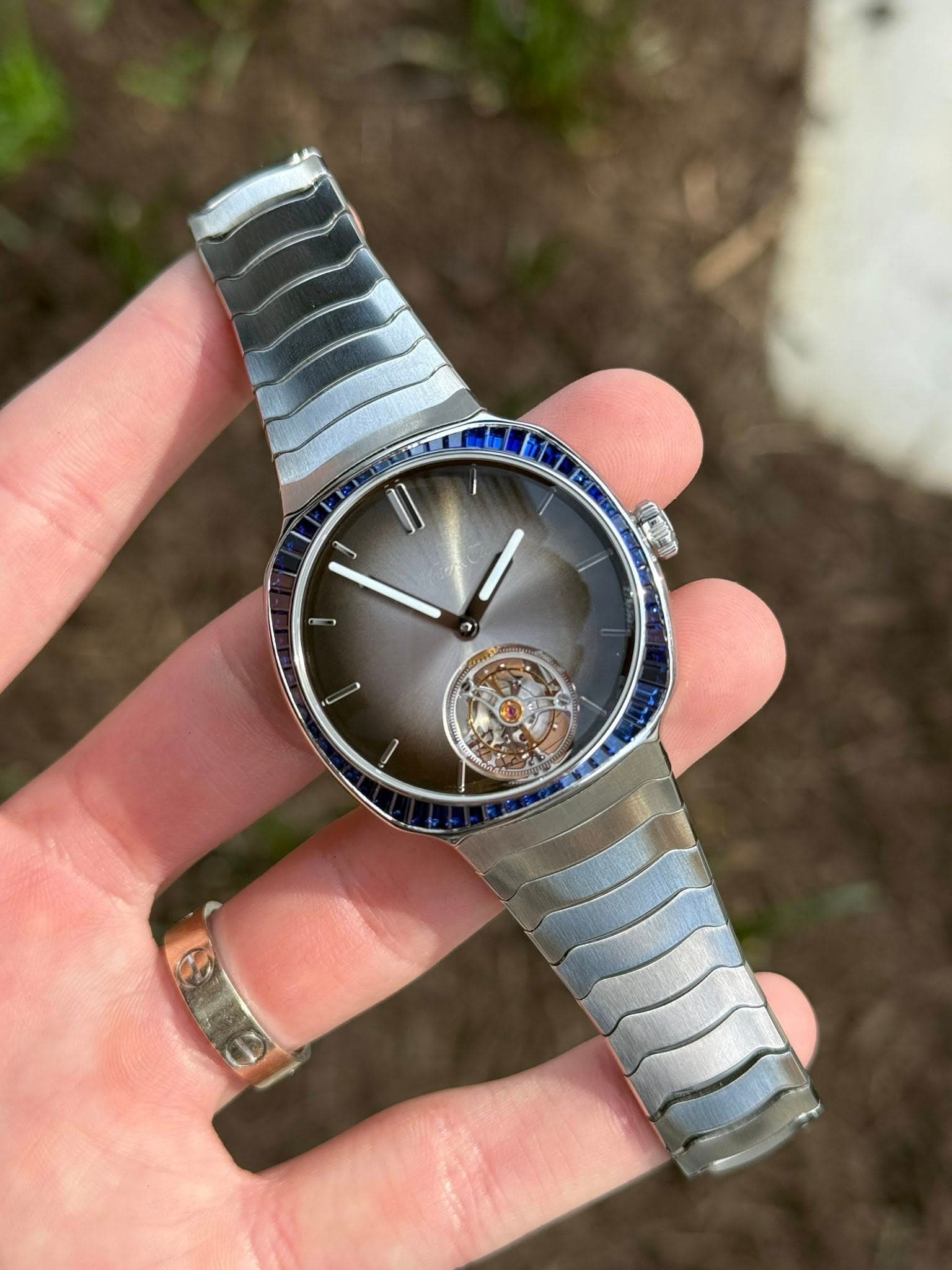 May be an image of wrist watch