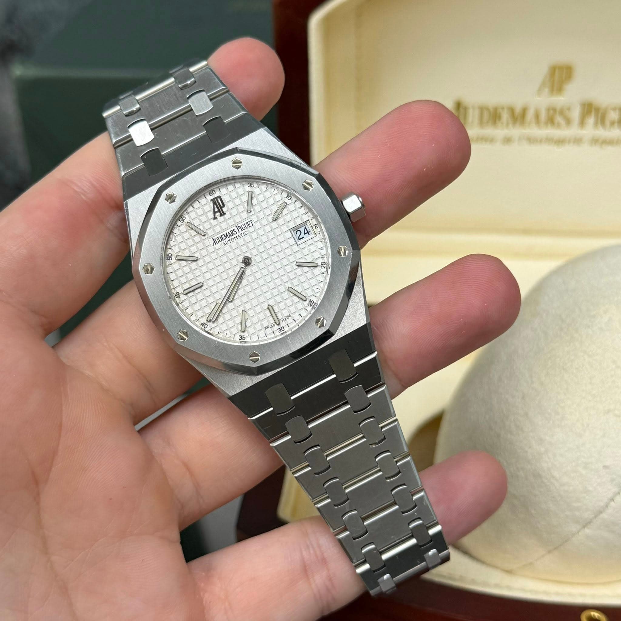 May be an image of wrist watch and text