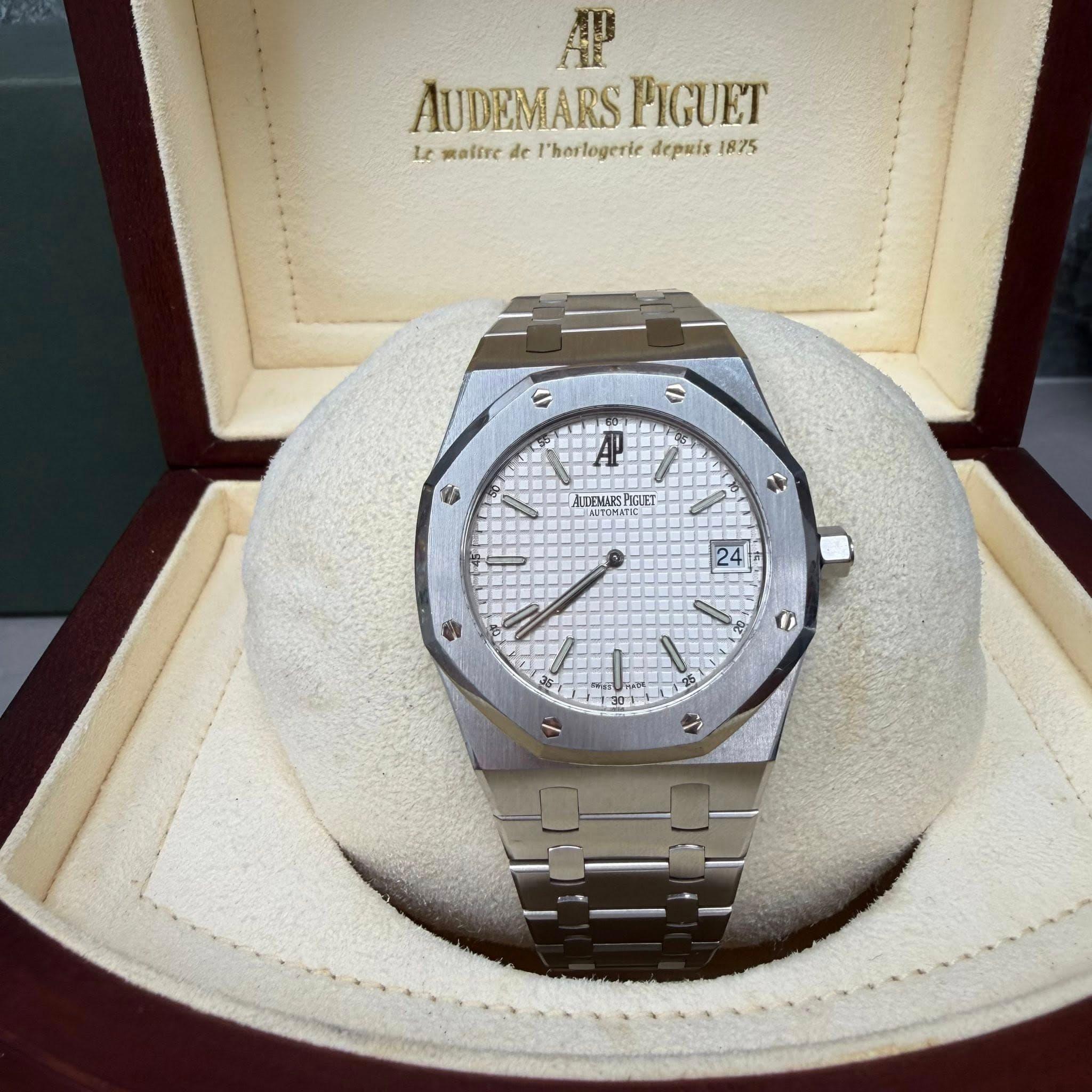 May be an image of wrist watch and text