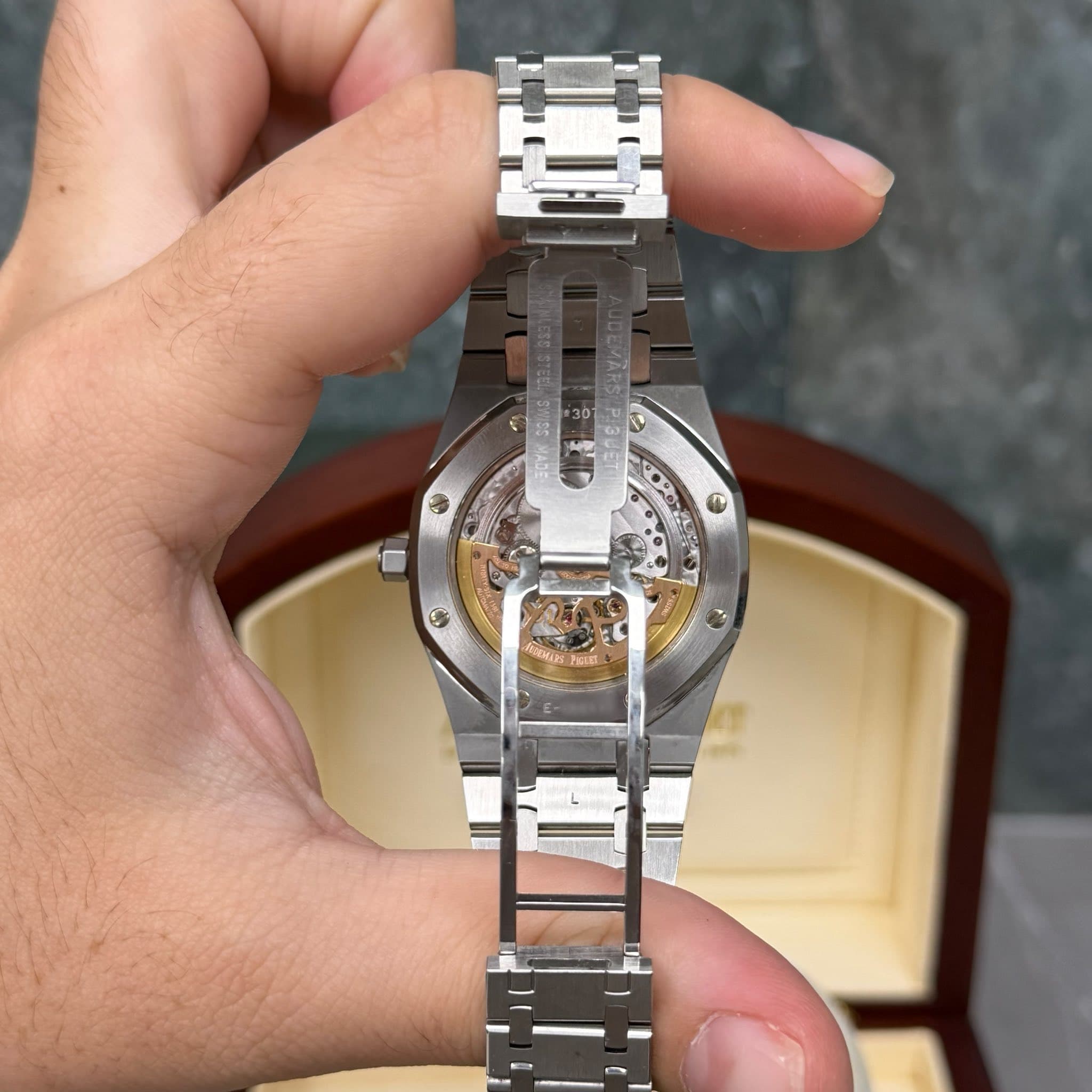 May be an image of wrist watch and text