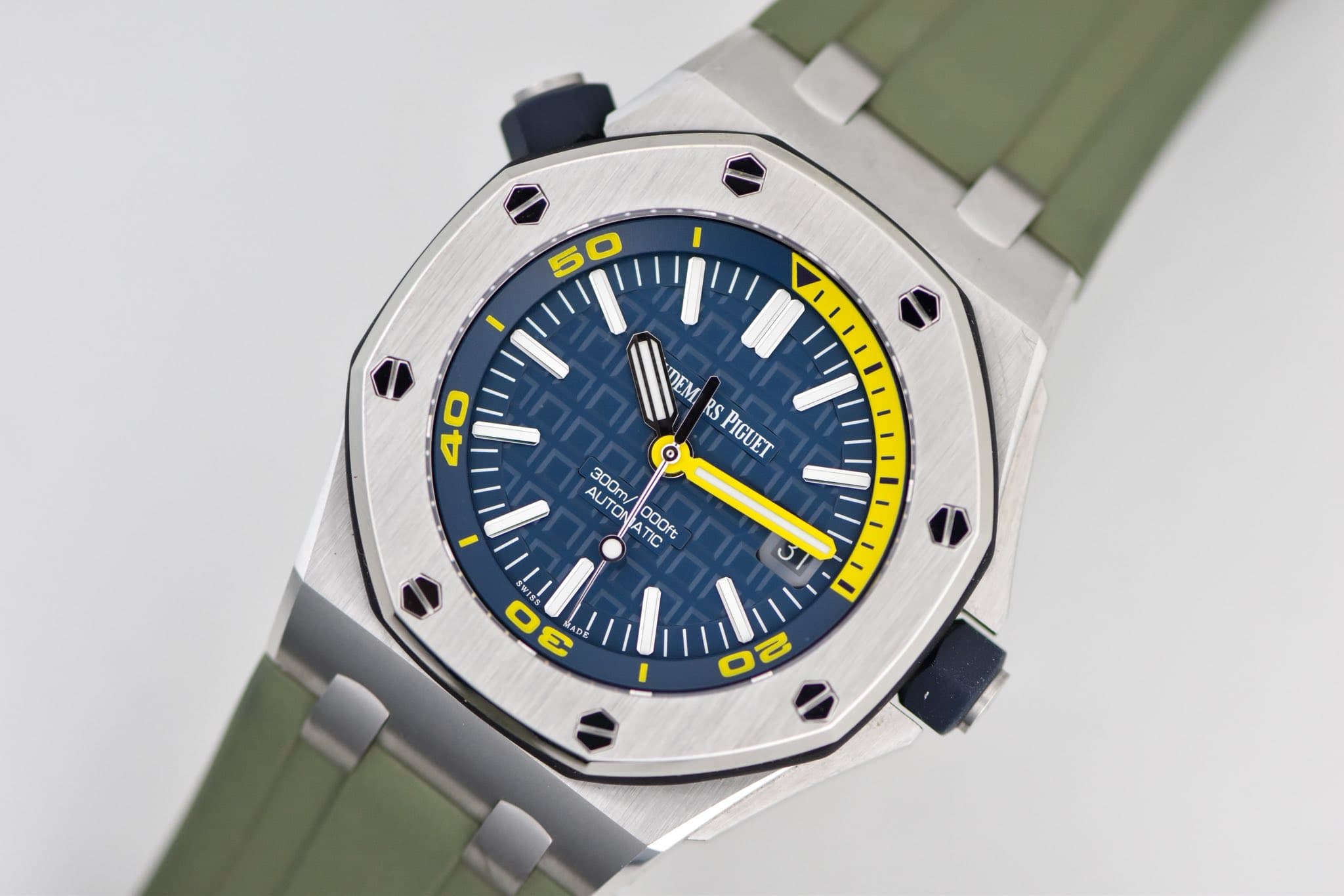 May be an image of wrist watch and text that says '50 40 DEM RS PIGUET AUTON 3OOm/ 30 300m ALA ATC ATIC ooOft 3 5 0 20'