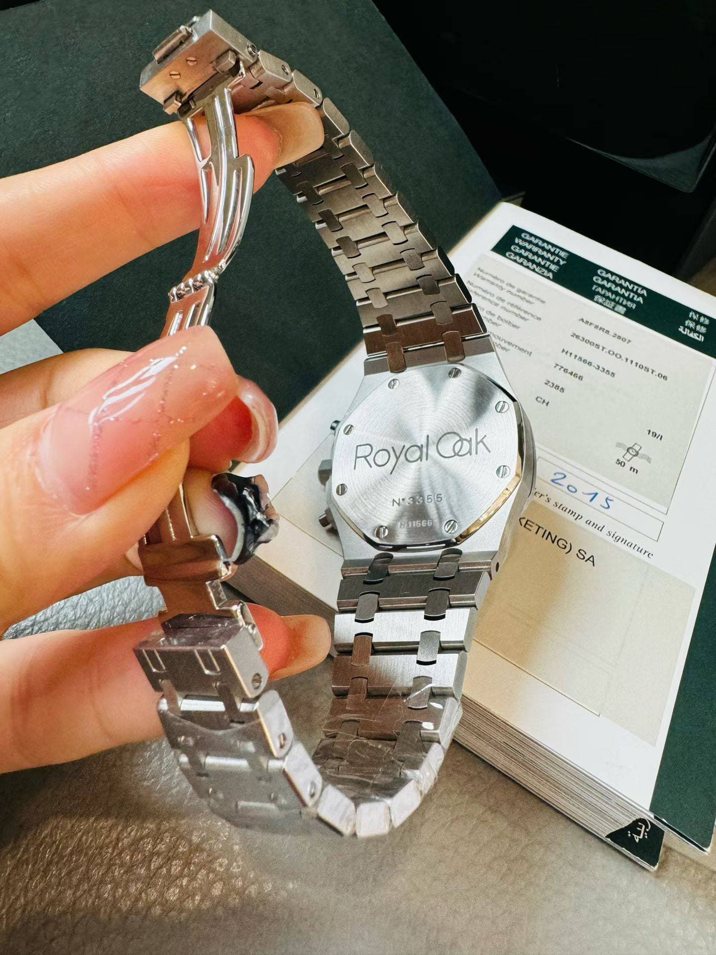 May be an image of digital watch and text