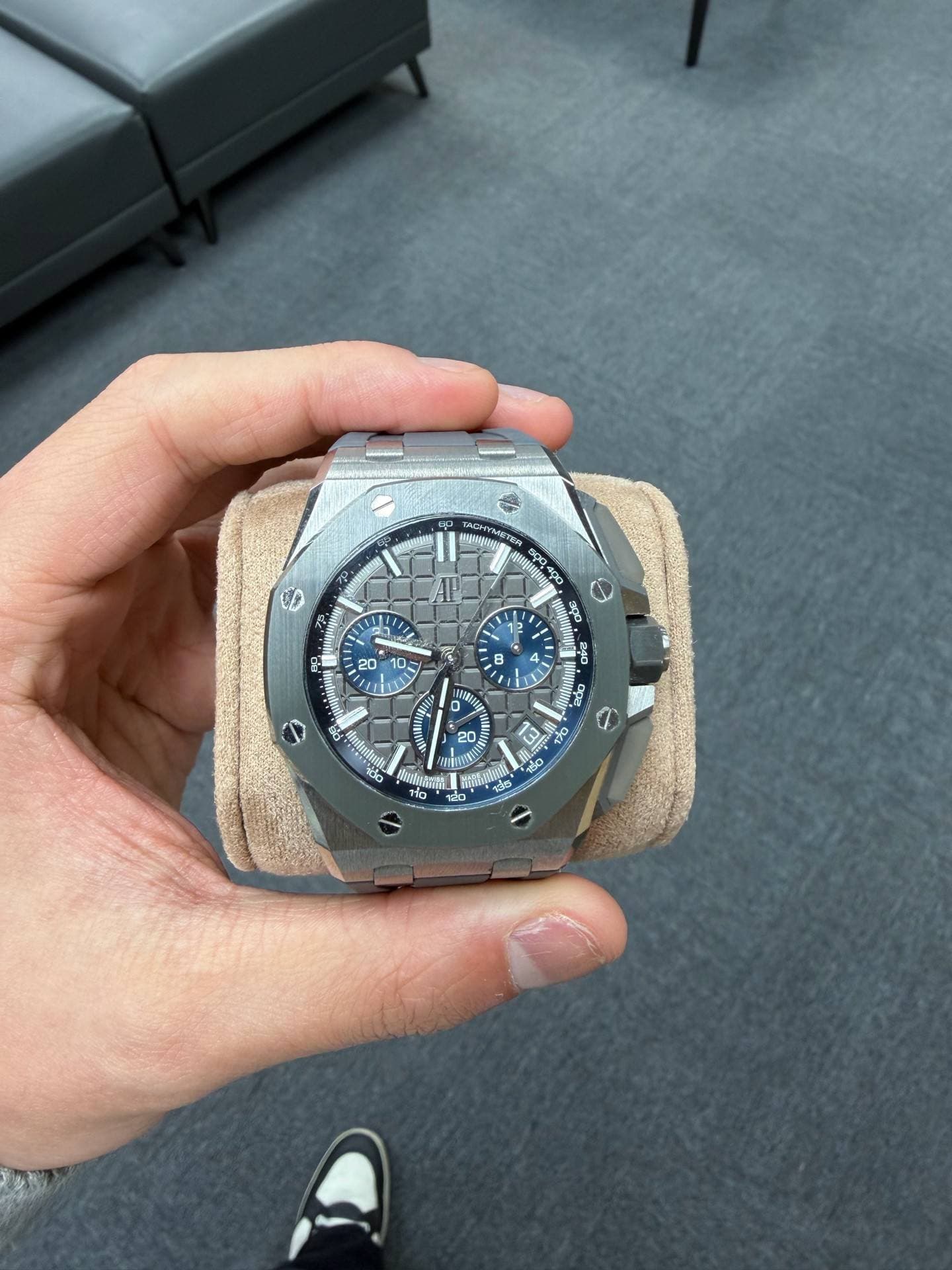 May be an image of wrist watch and text
