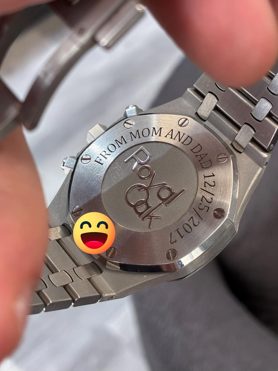 May be an image of wrist watch and text that says 'FROM MOM MOMAND AND AROM 1 12/2 τουι poлue'