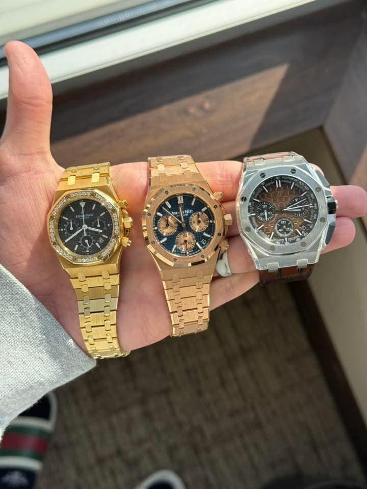 May be an image of wrist watch and text