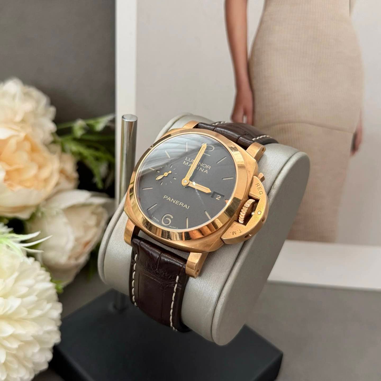 May be an image of wrist watch and text