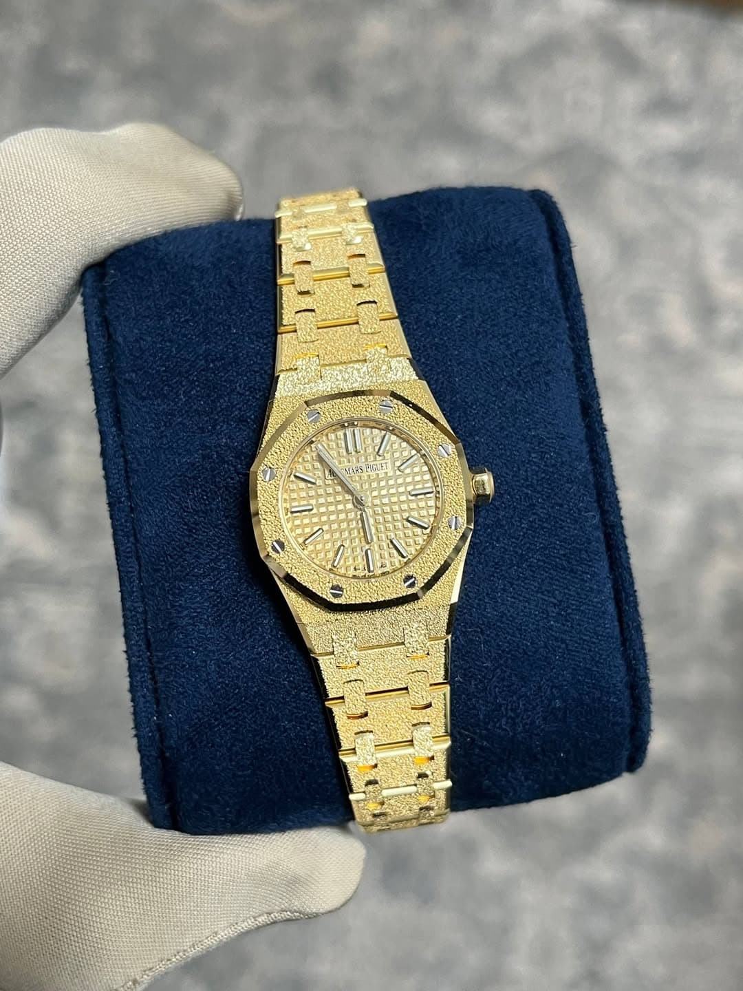 May be an image of wrist watch and text