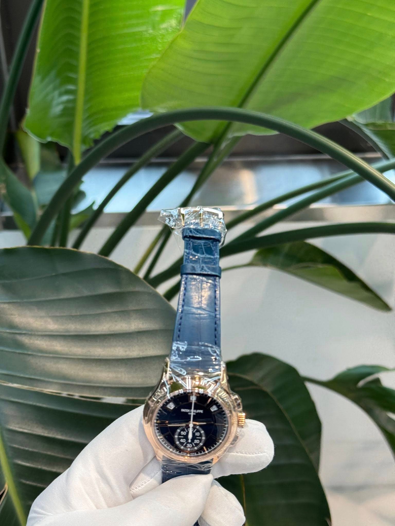 May be an image of wrist watch and text