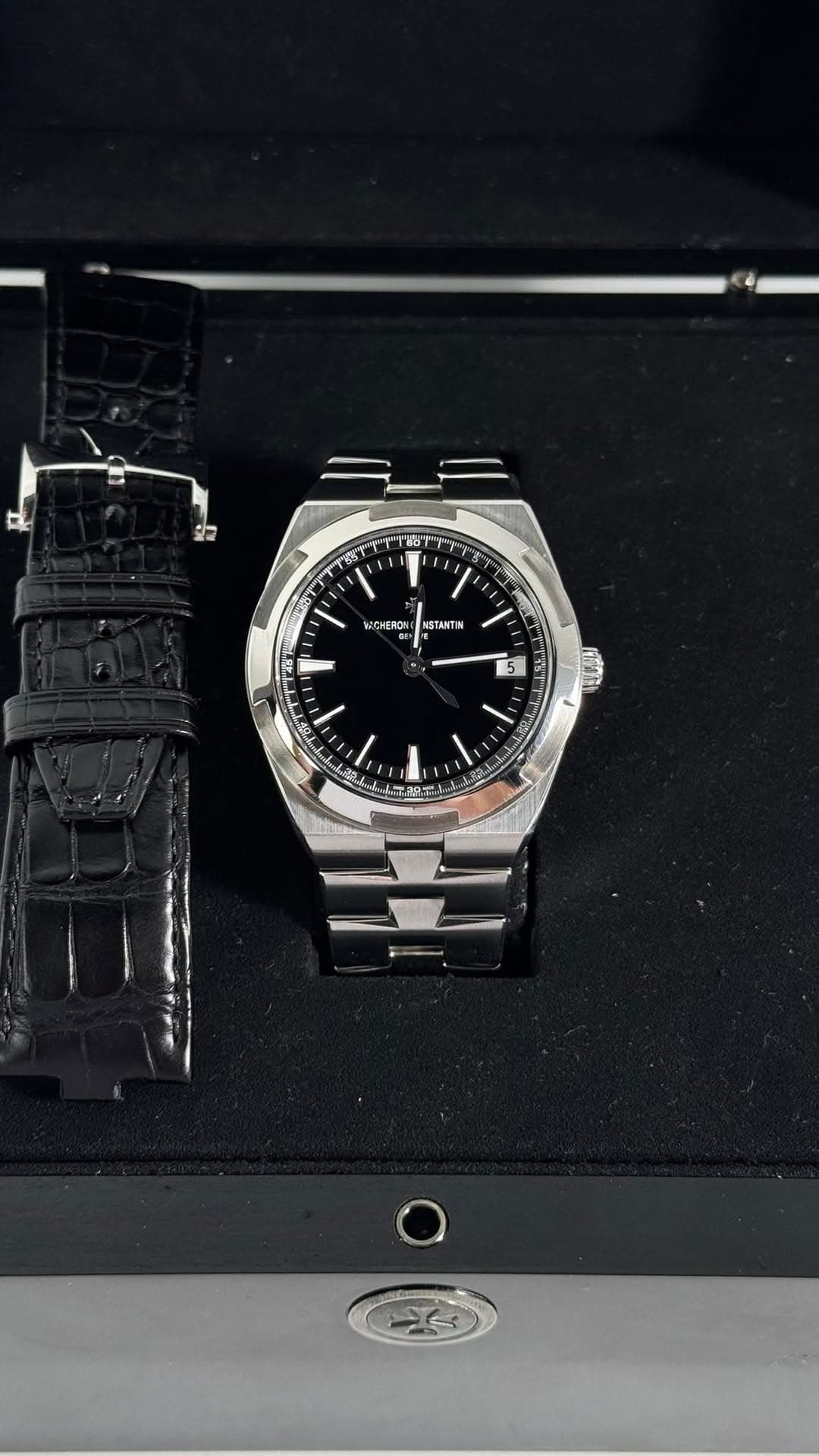 May be an image of wrist watch and text