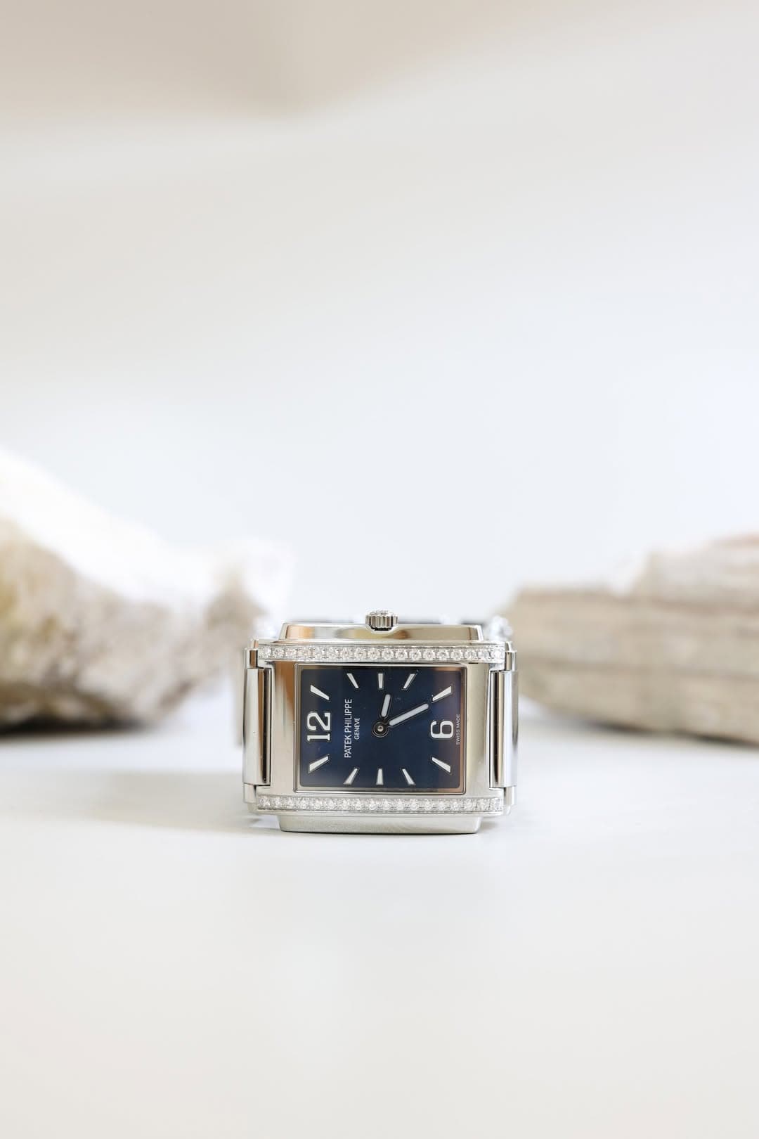May be an image of ring, wrist watch and text