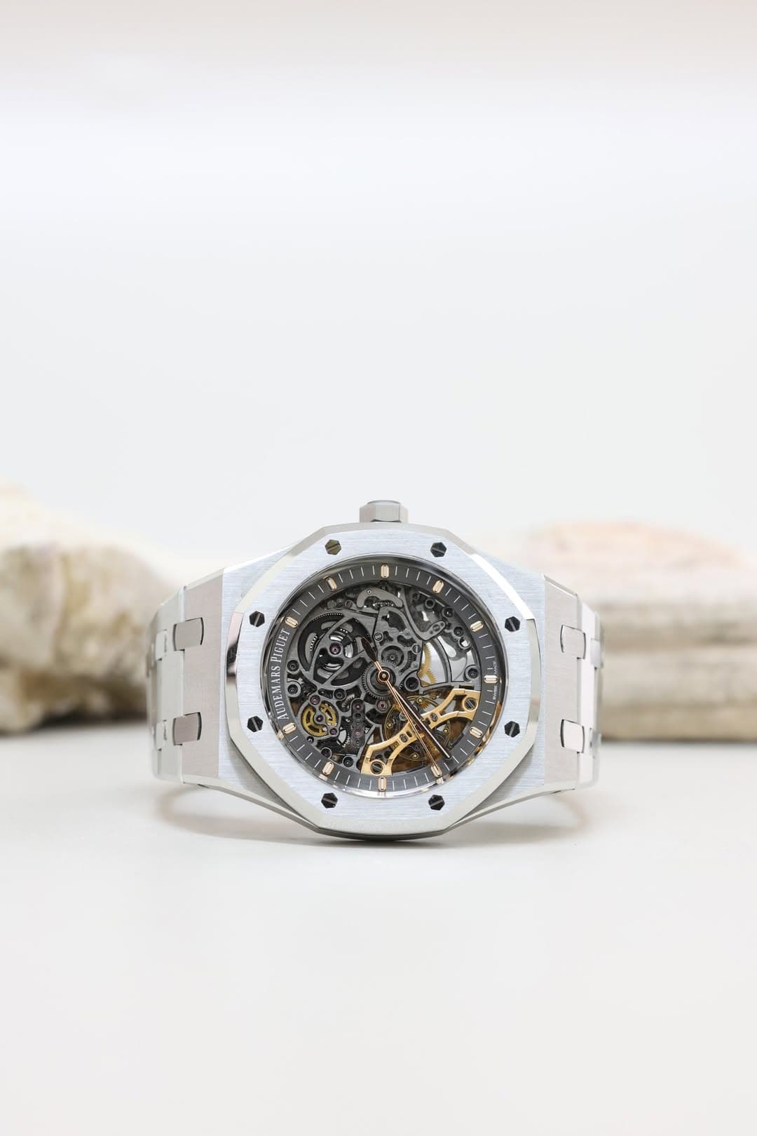 May be an image of wrist watch and text