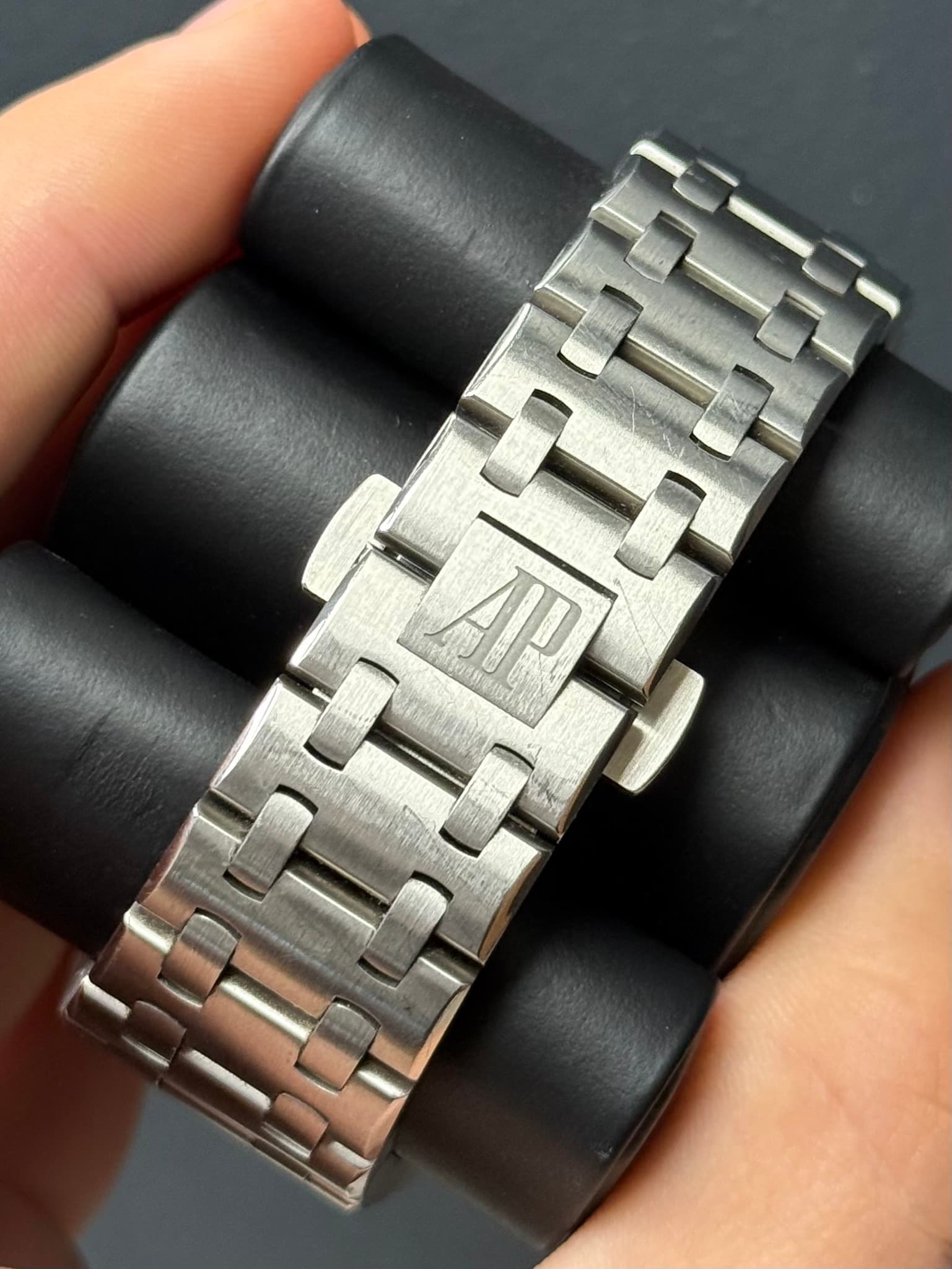 May be an image of jewelry, digital watch and text that says 'AP'