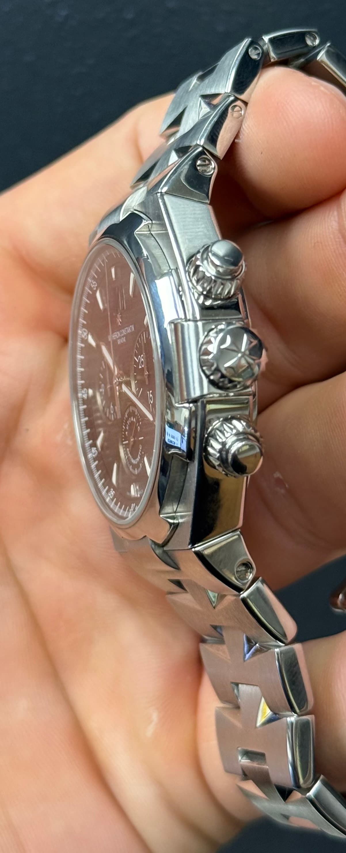 May be an image of wrist watch and text