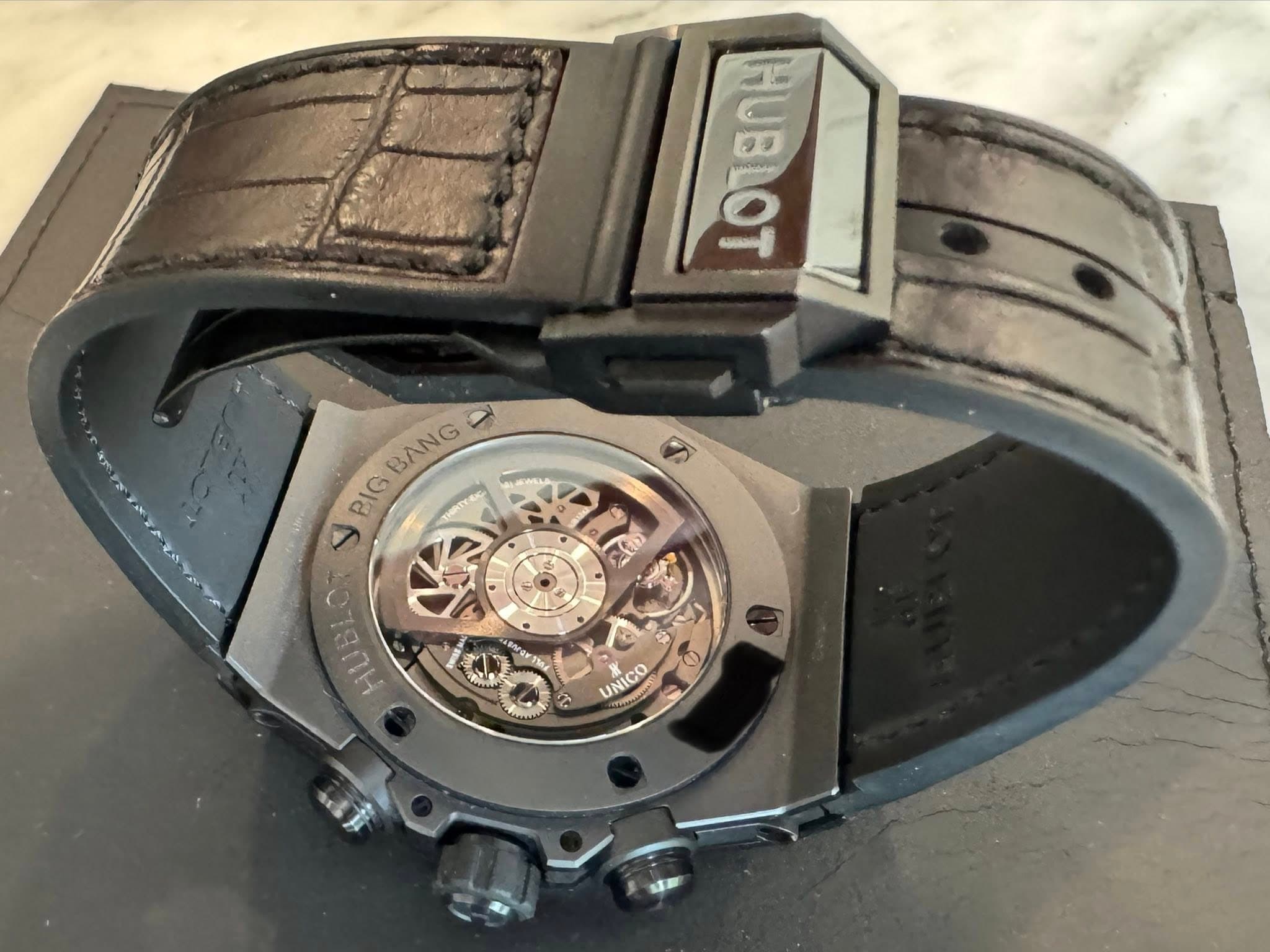 May be an image of wrist watch and text