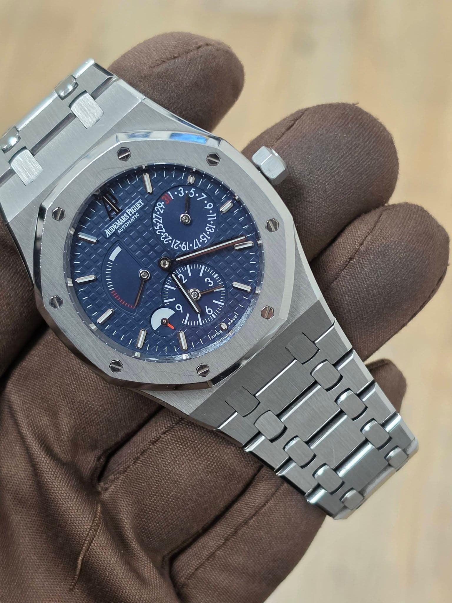 May be an image of wrist watch and text
