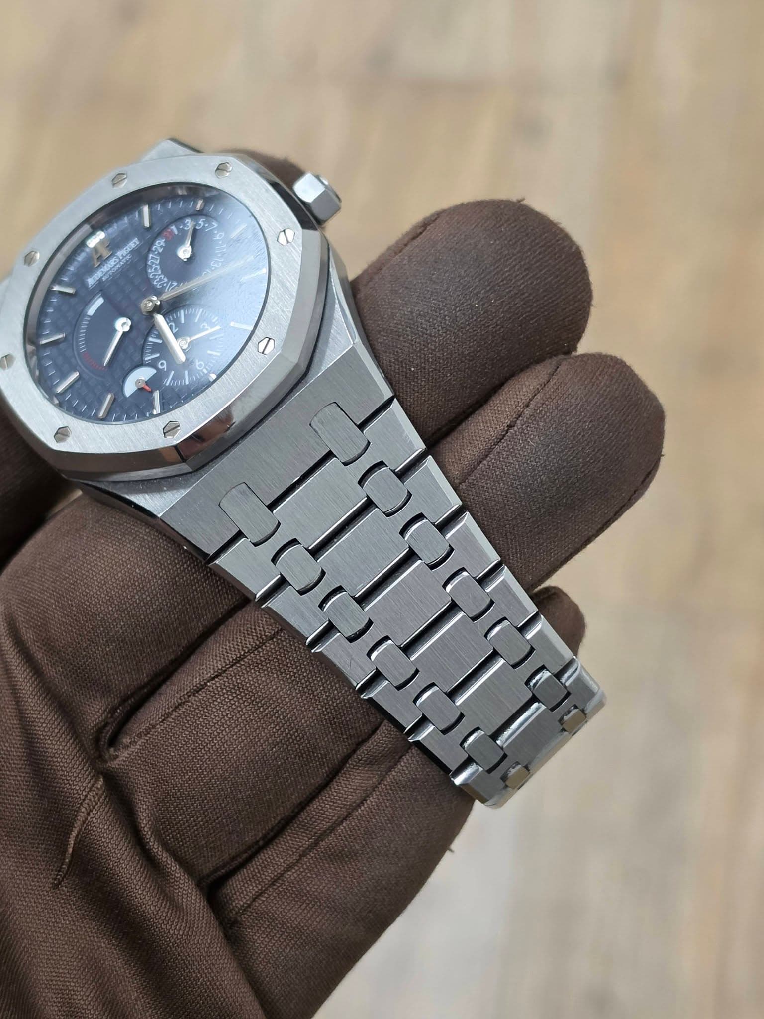 May be an image of wrist watch and text