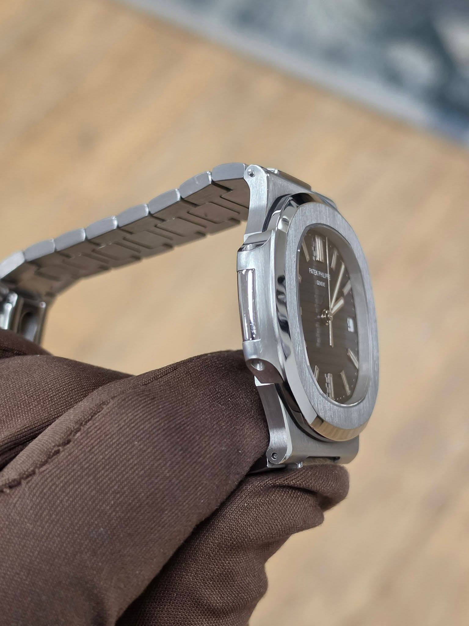 May be an image of wrist watch and text