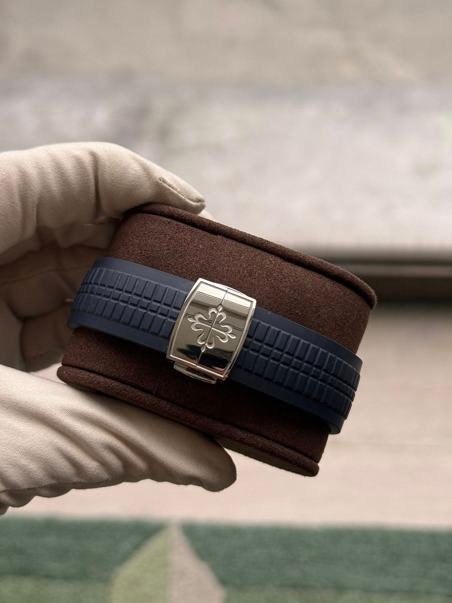 May be an image of wrist watch and leather