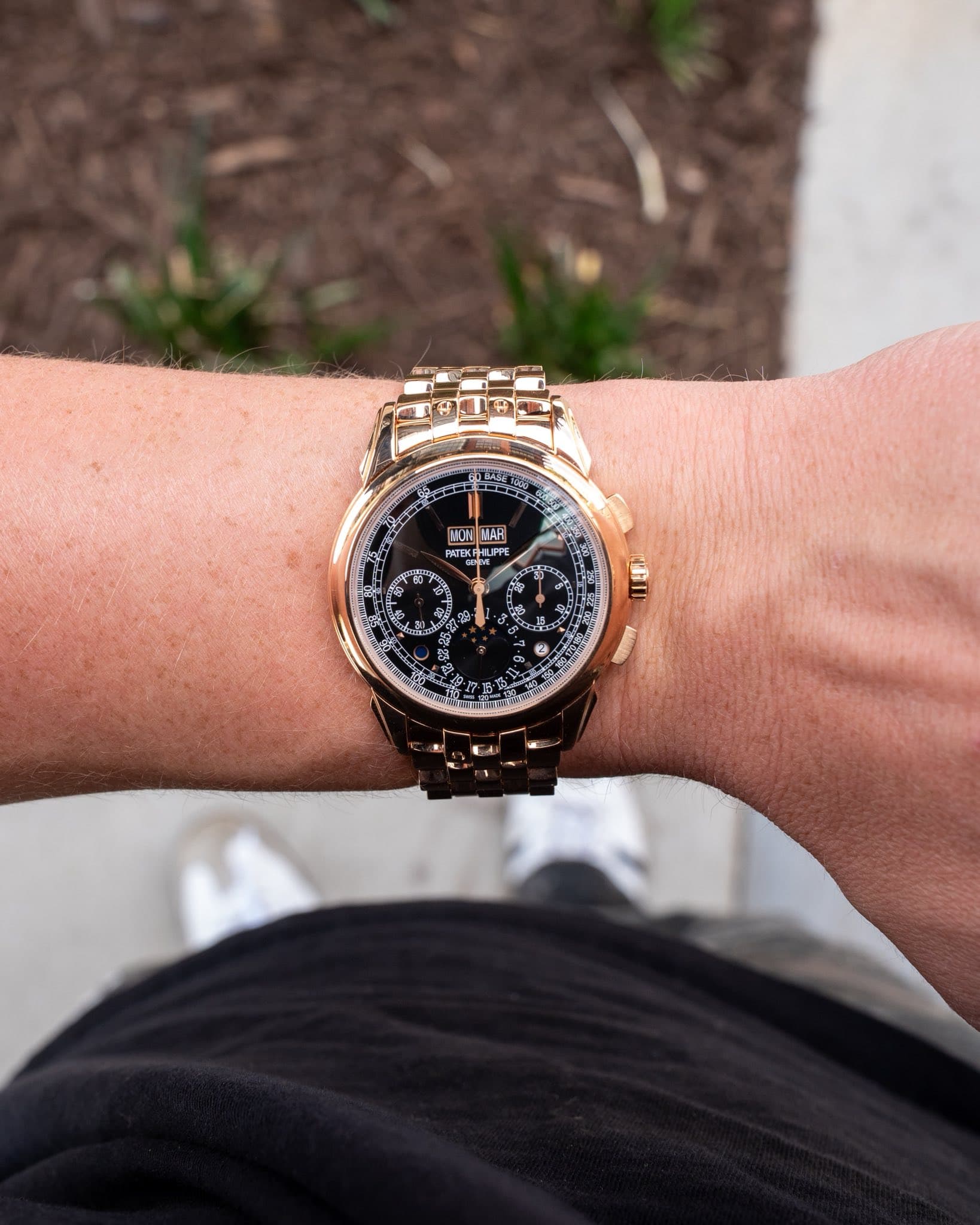 May be an image of wrist watch and text