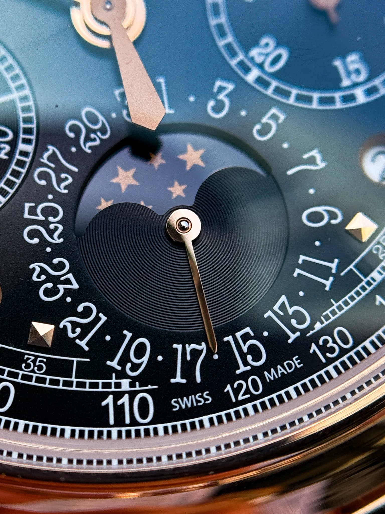 May be an image of wrist watch and text that says '安 3 15 በረጅርያጅ مج ឆ្ល 1l MADE MADE SWISS 120'