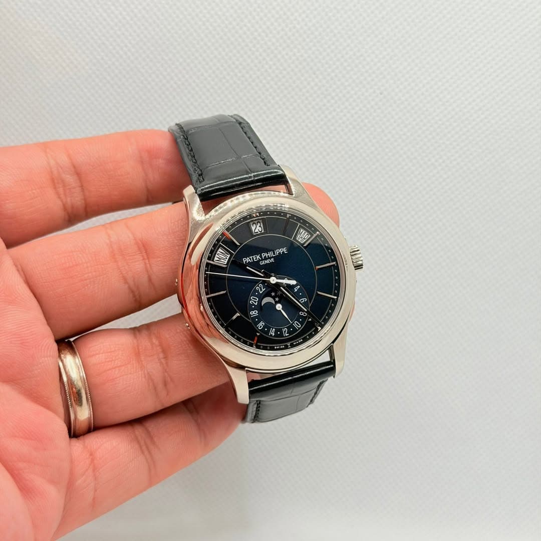 May be an image of wrist watch and text