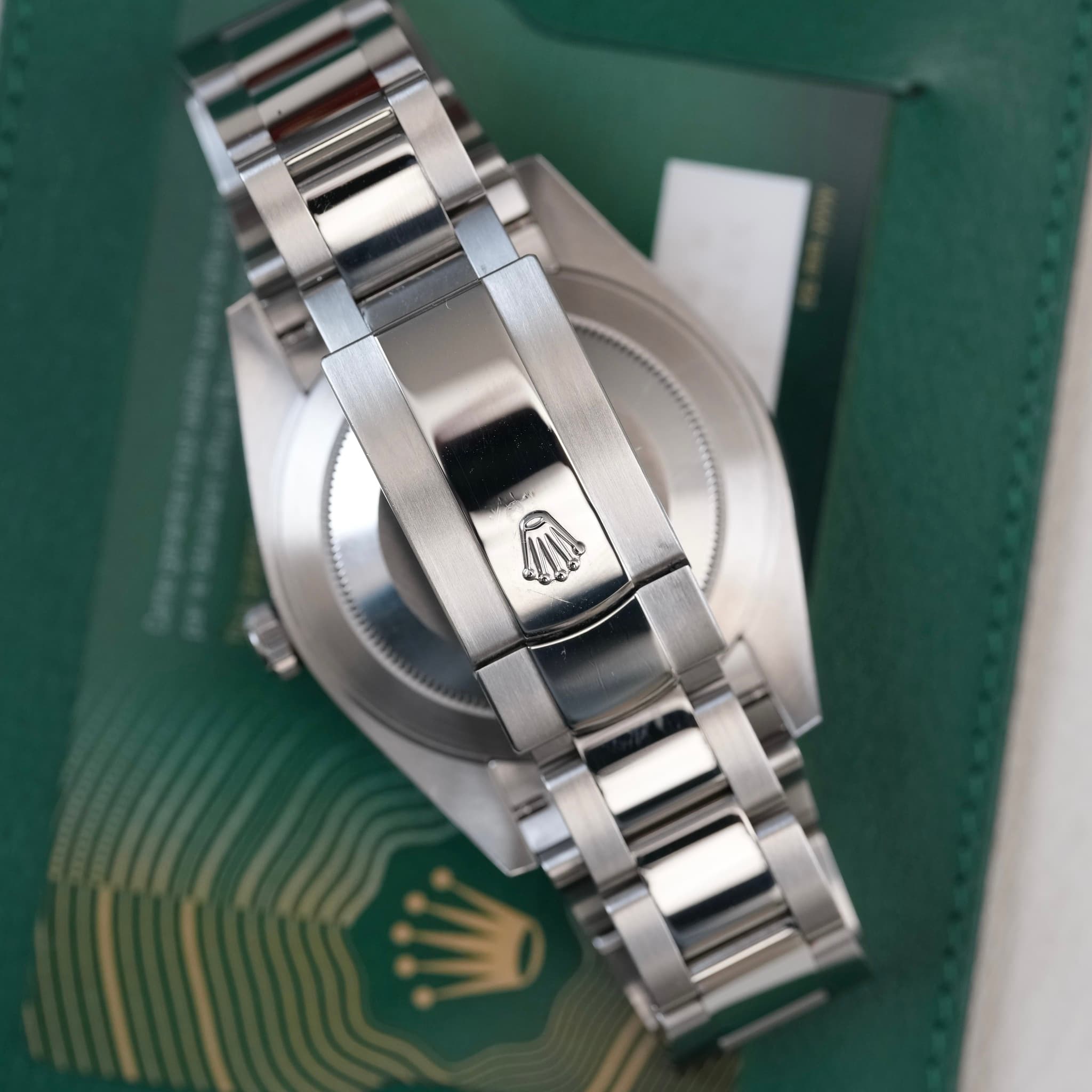 May be an image of wrist watch and text