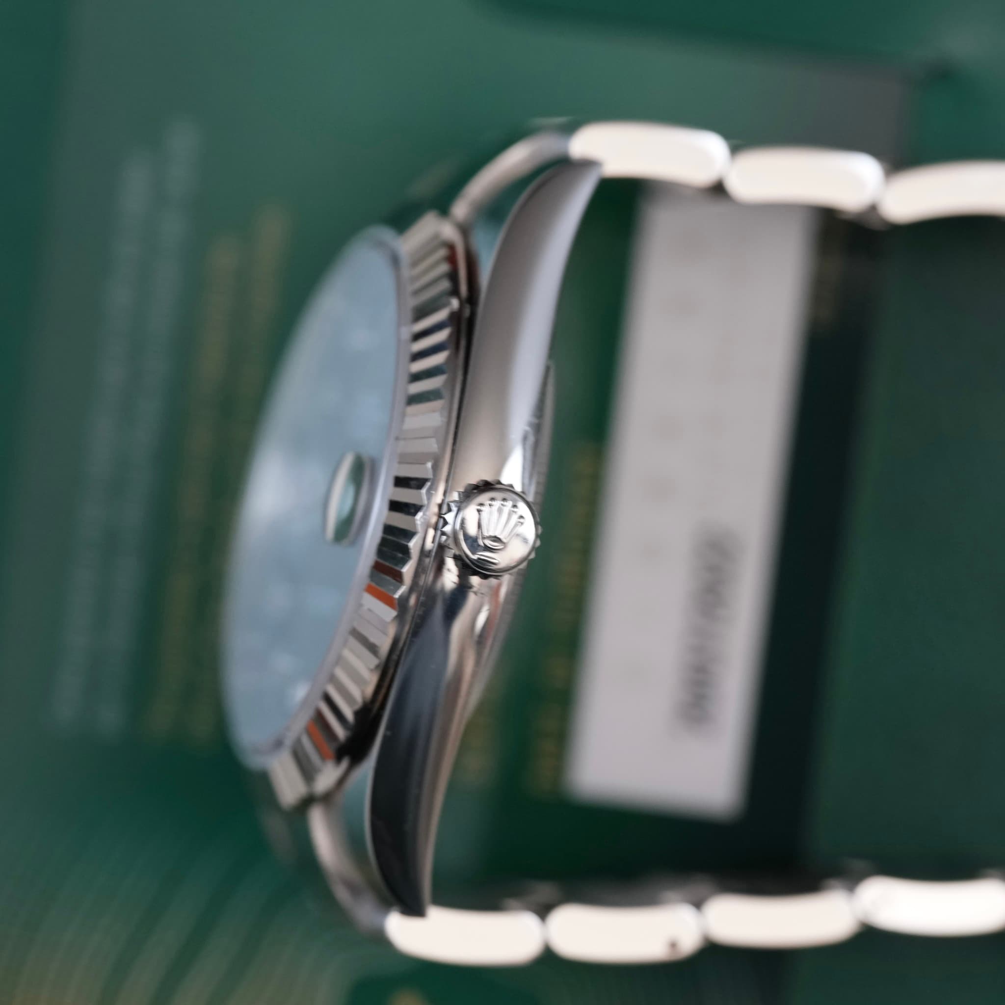 May be an image of wrist watch and text