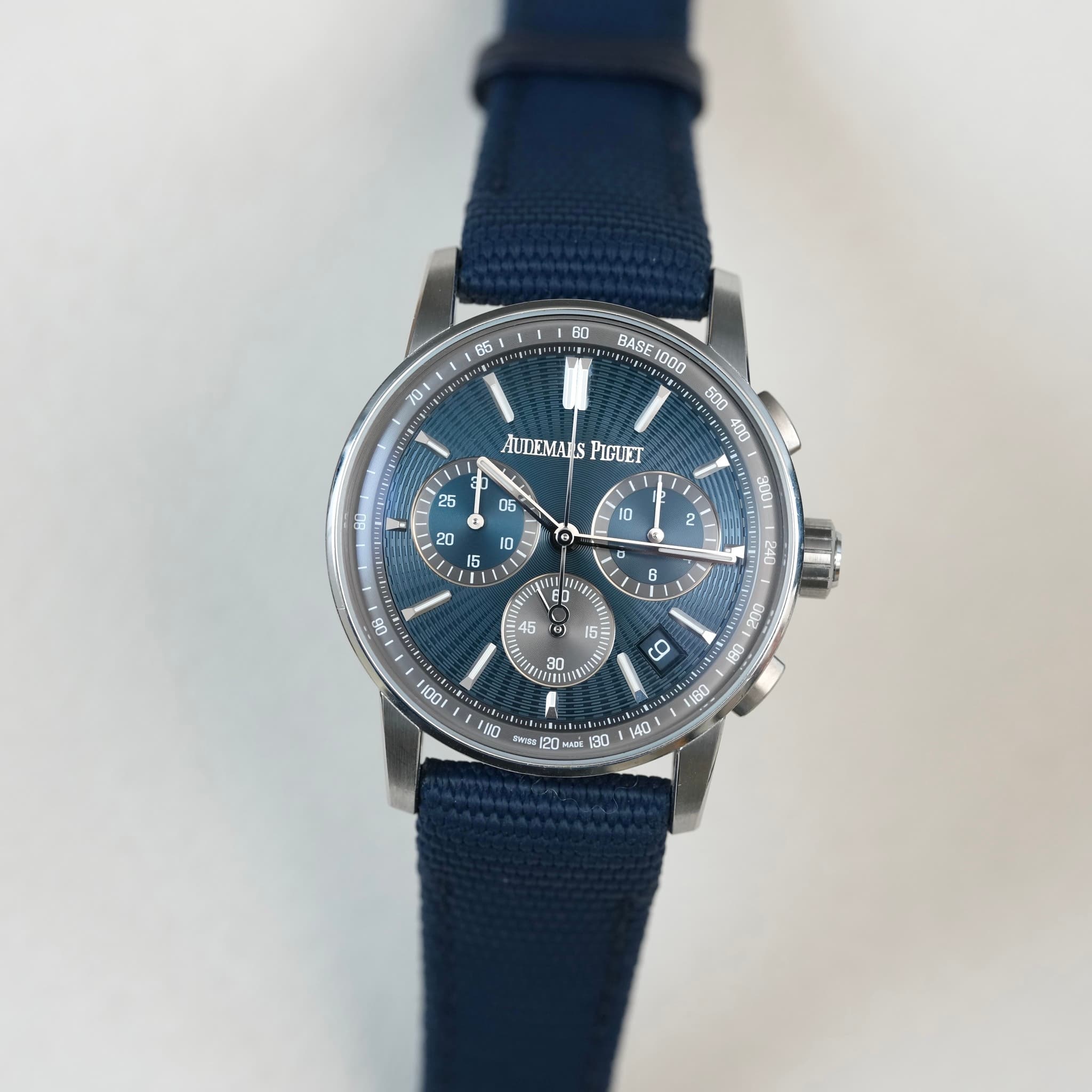 May be an image of wrist watch and text