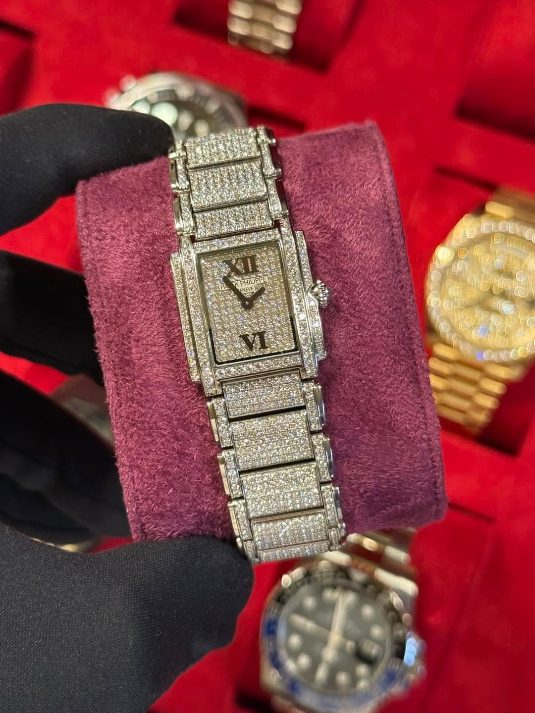 May be an image of wrist watch and text