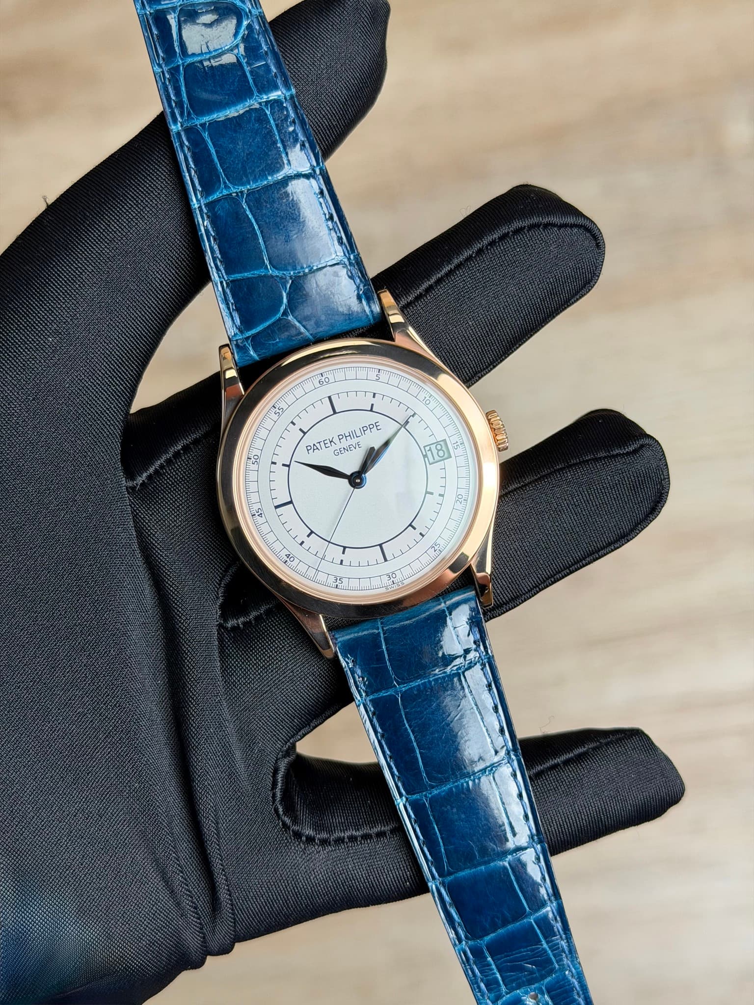 May be an image of wrist watch, leather and text that says 'ST 1e A 80 PATEK GINEVE GENEYE PHILIPPE ana ပ်'