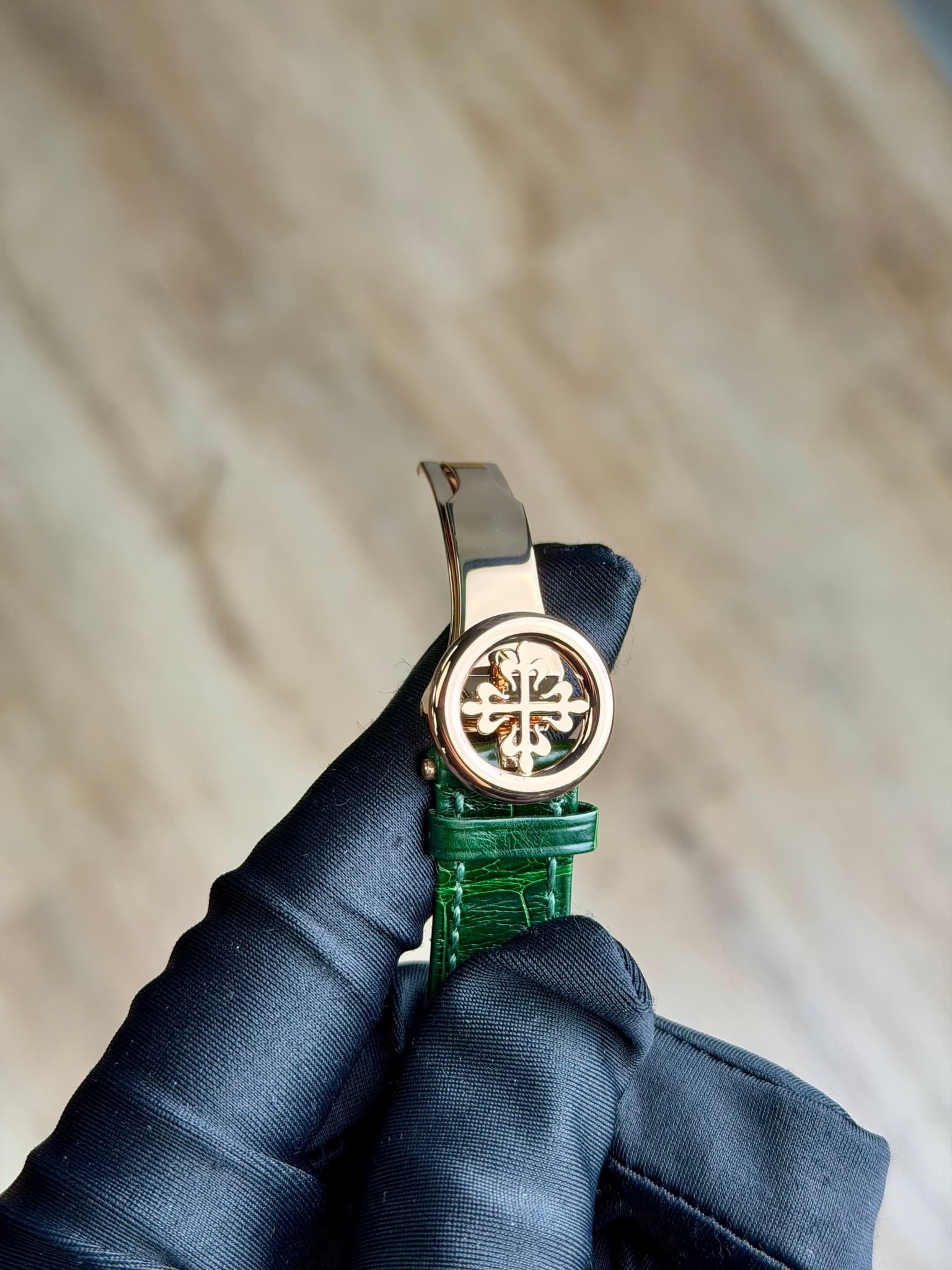 May be an image of wrist watch, leather and text that says '米 កូត حا'
