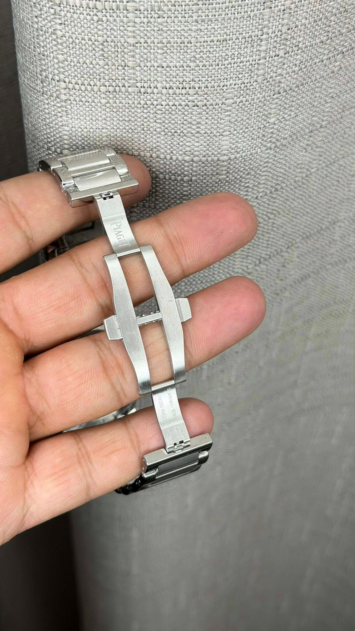 May be an image of wrist watch