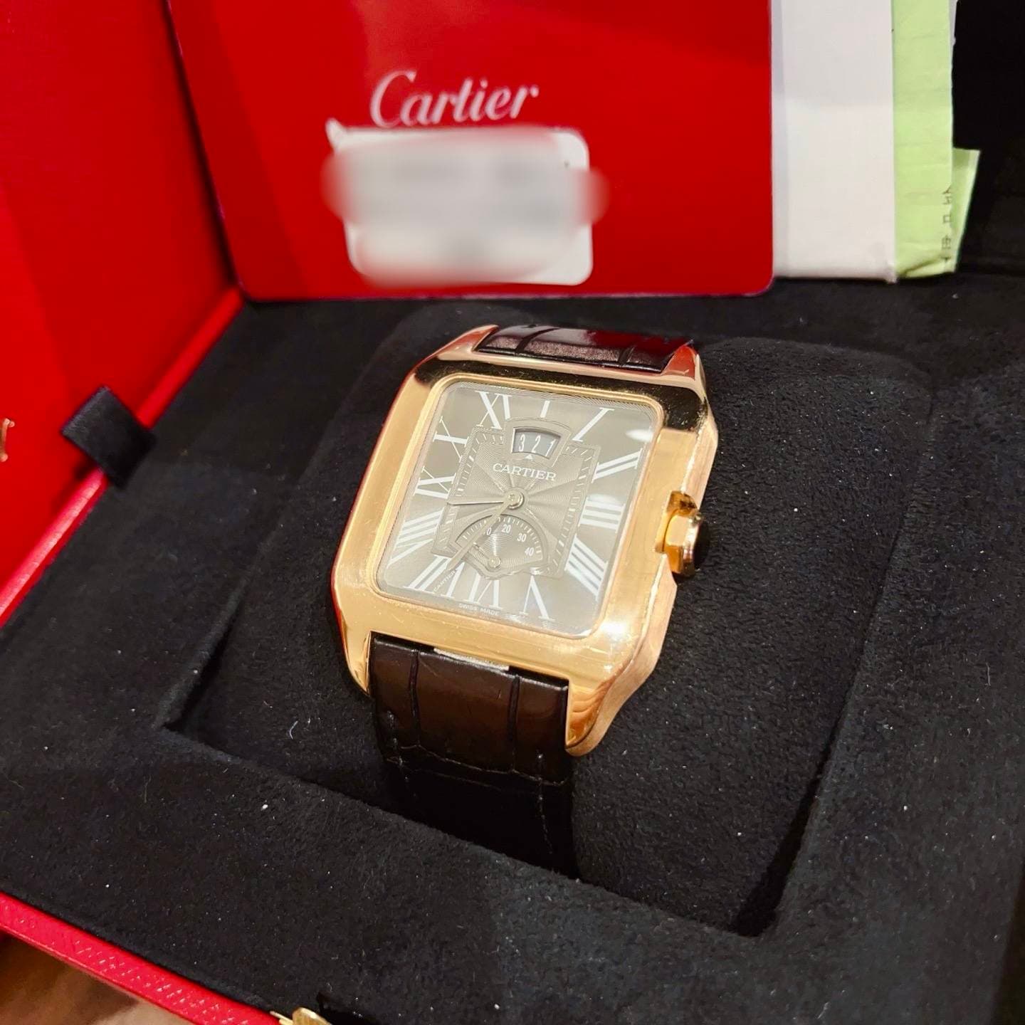 May be an image of wrist watch and text