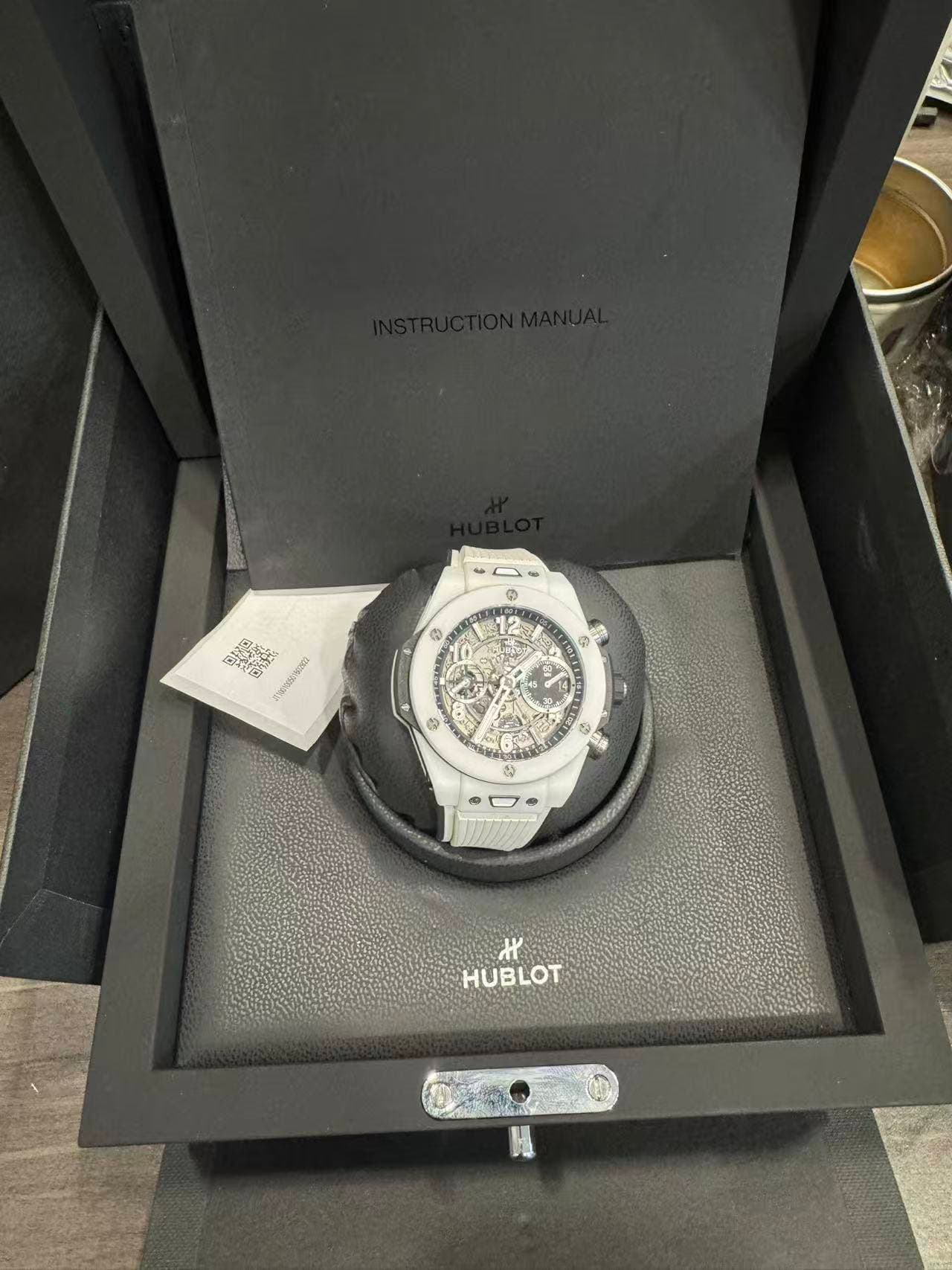 May be an image of wrist watch and text