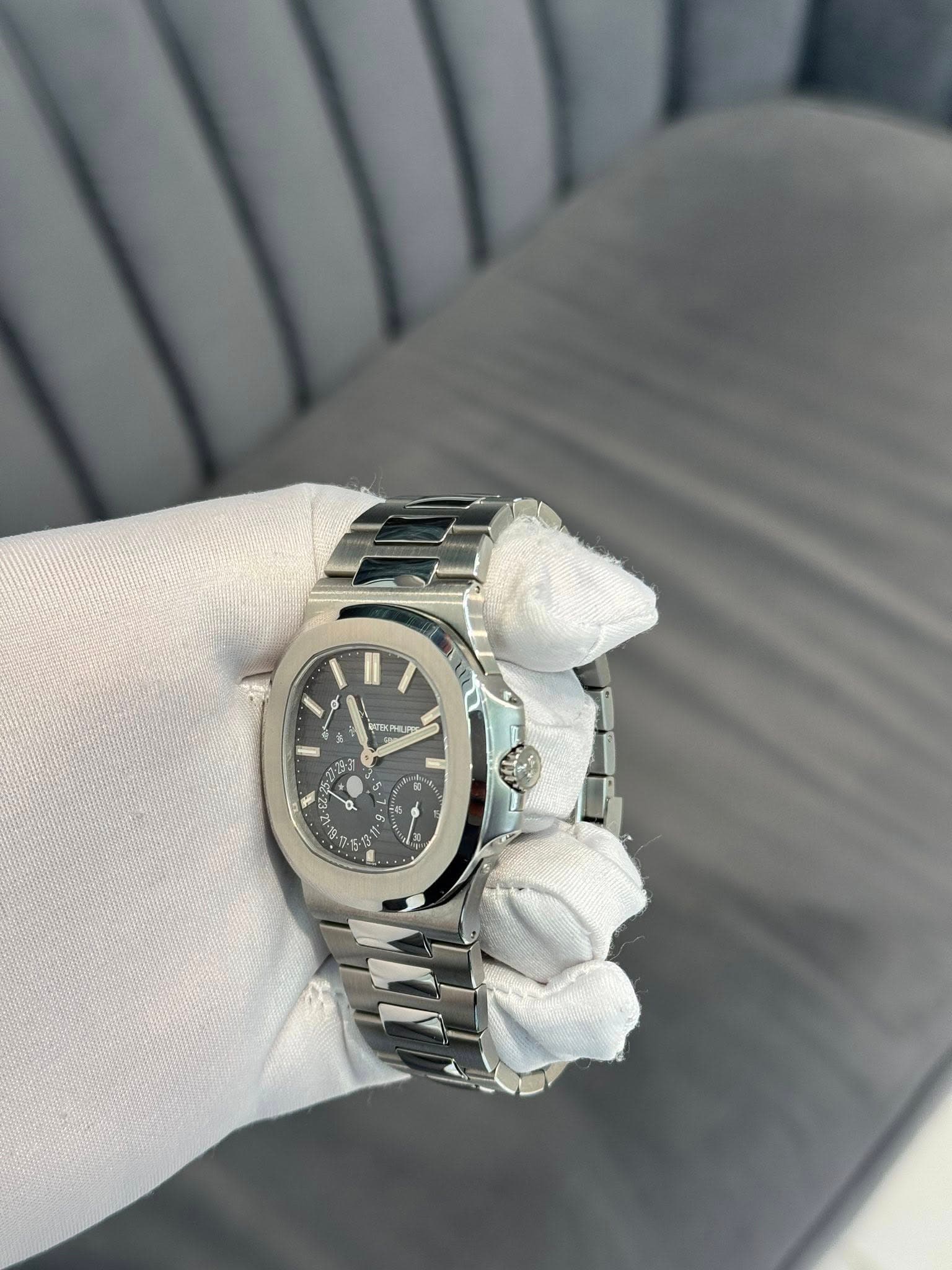 May be an image of wrist watch and text